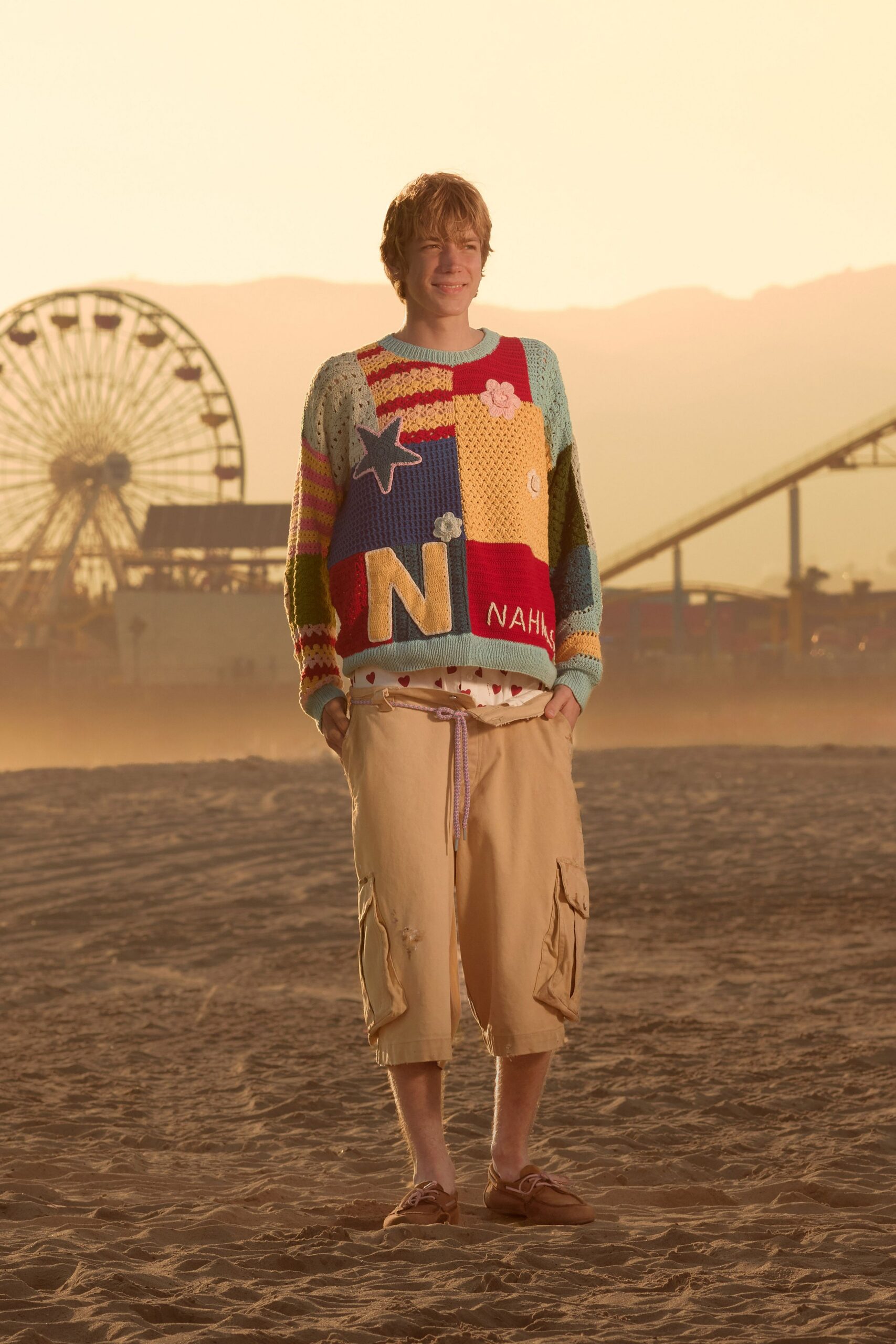 multi-colored knitted sweater with cargo shorts