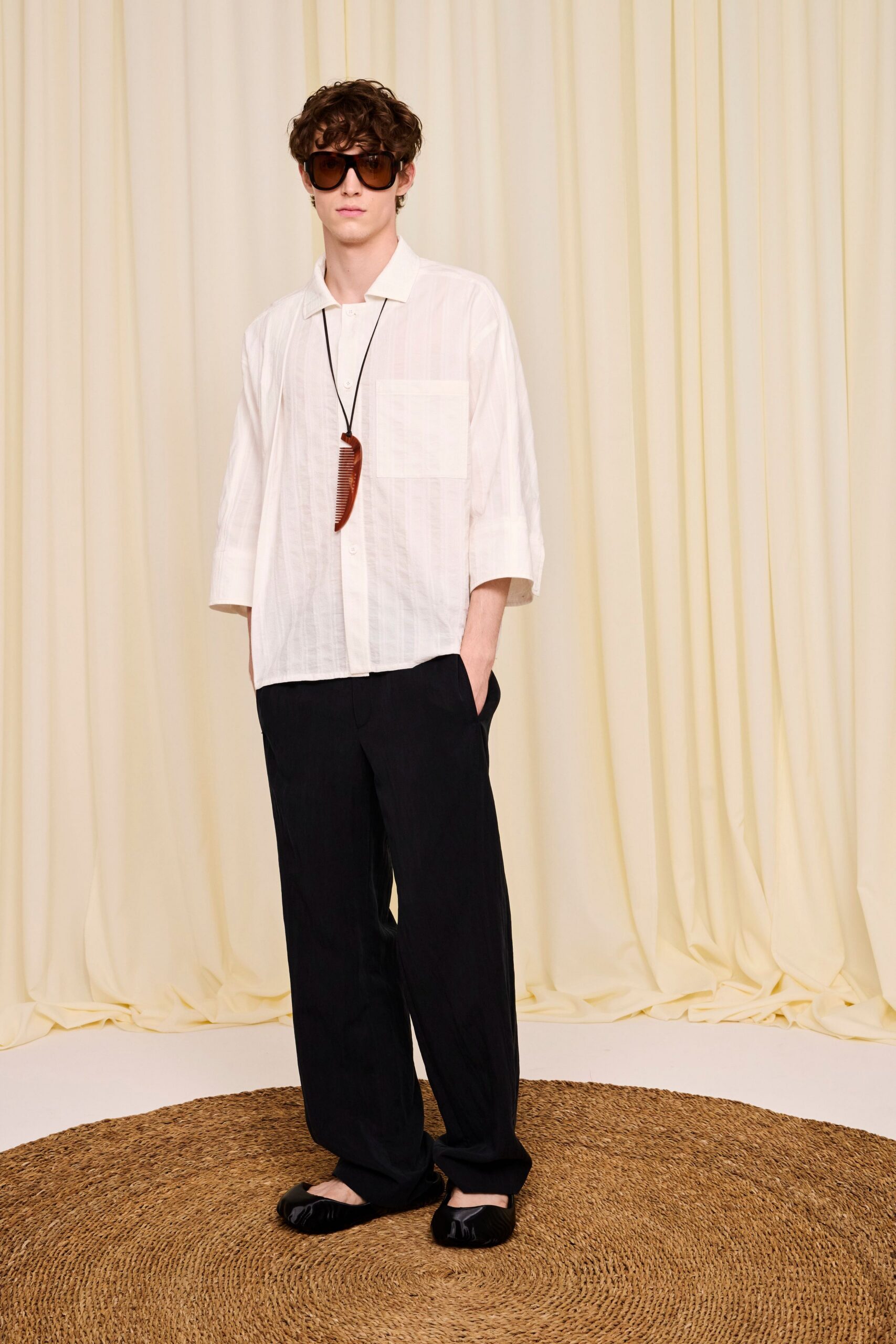 white relaxed shirt black pants