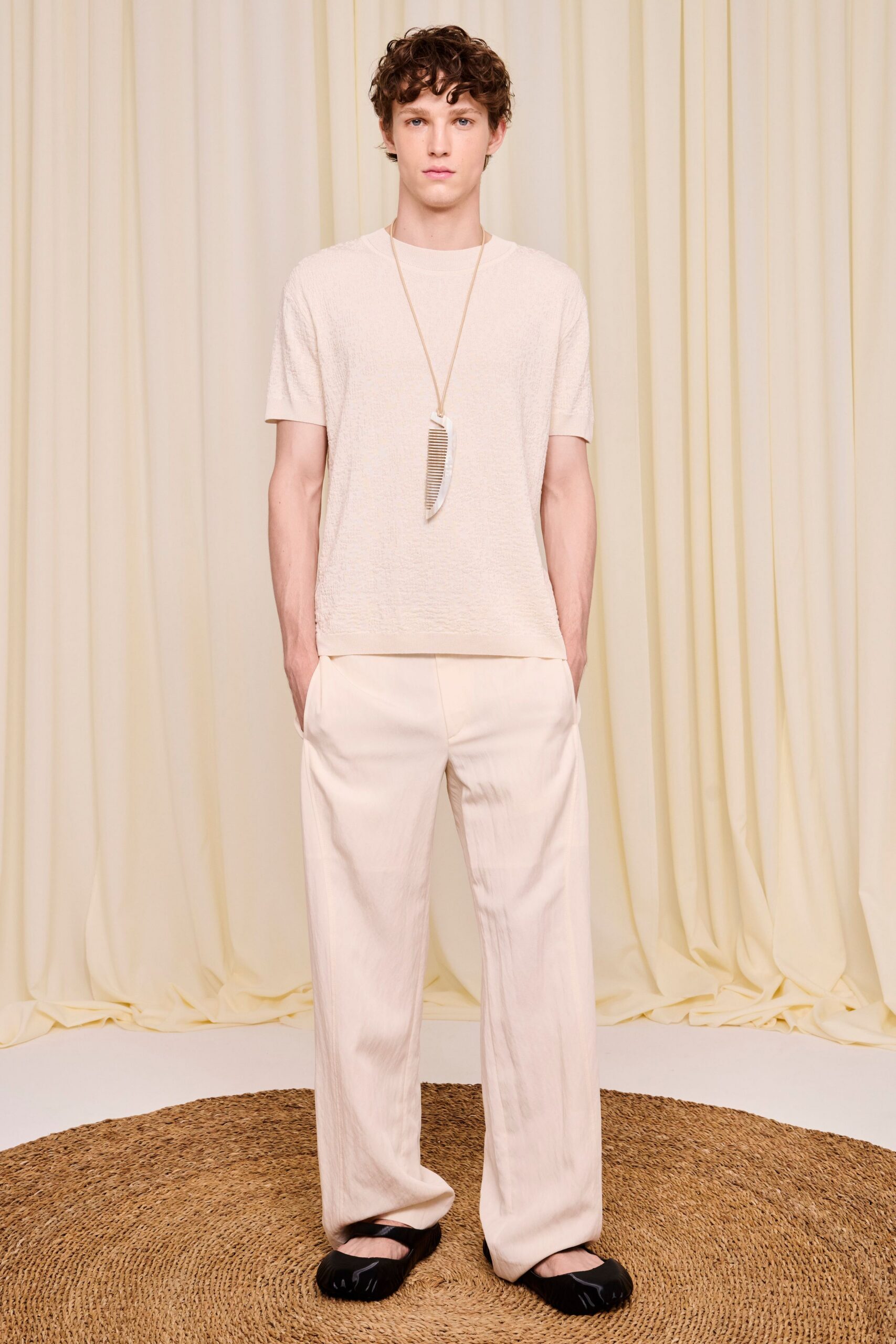 white relaxed t-shirt with beige pants