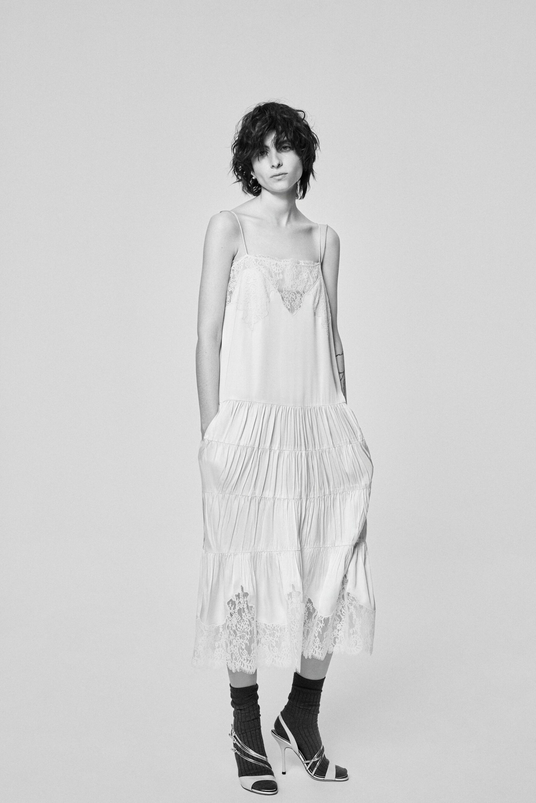 white cotton sleeveless v-neck relaxed pleated embroidered dress