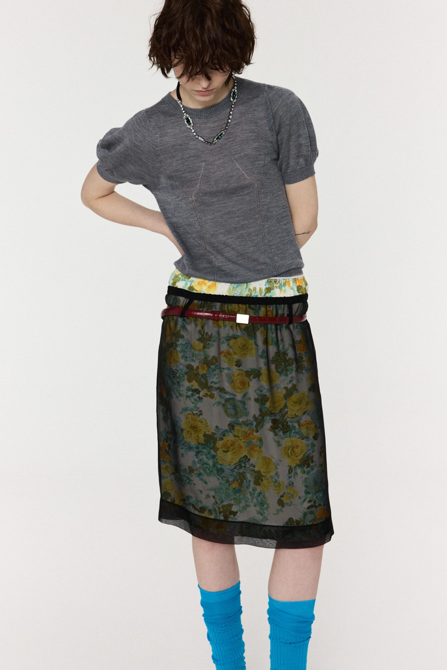 gray top with floral skirt