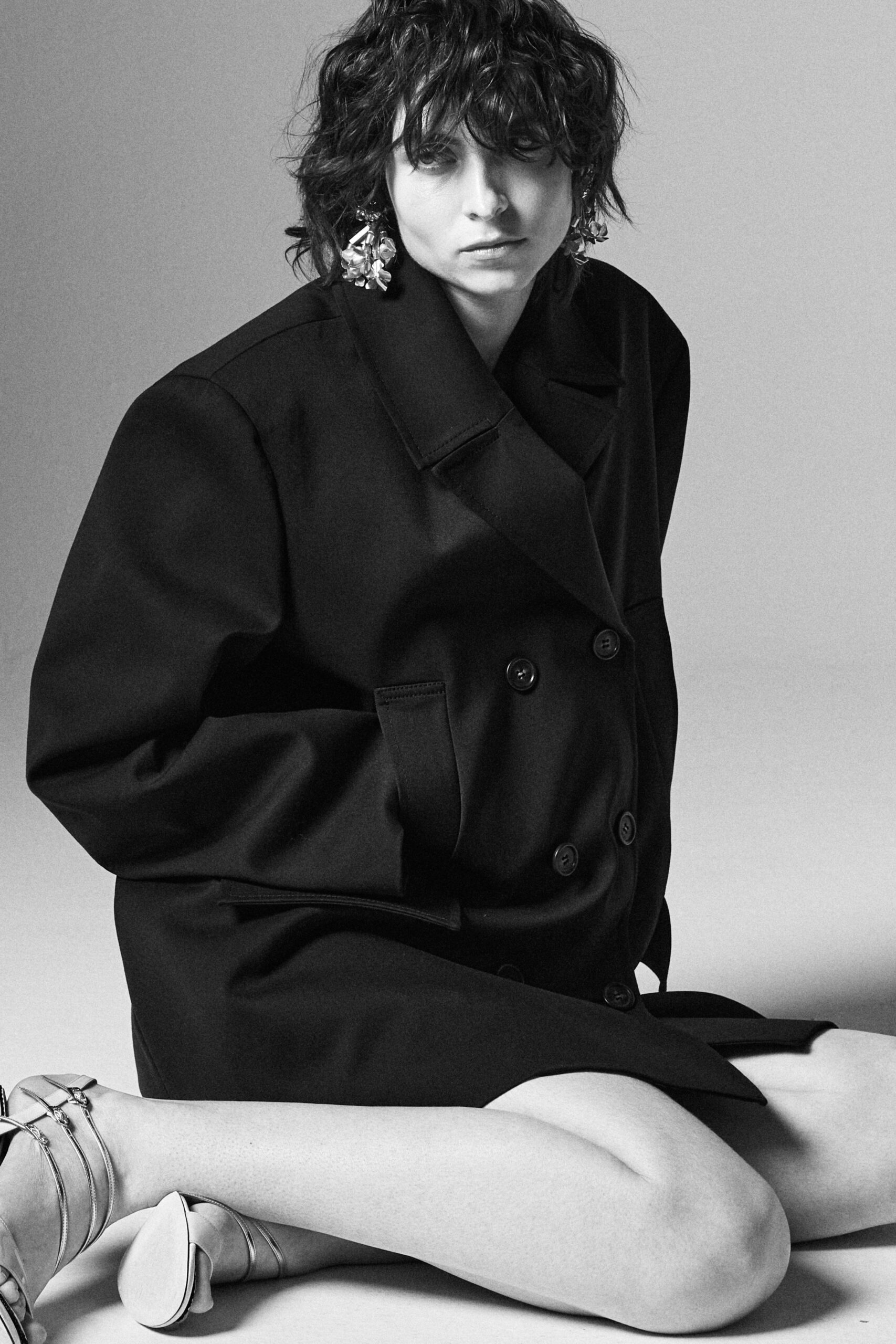 black wool long-sleeve collared relaxed midi coat