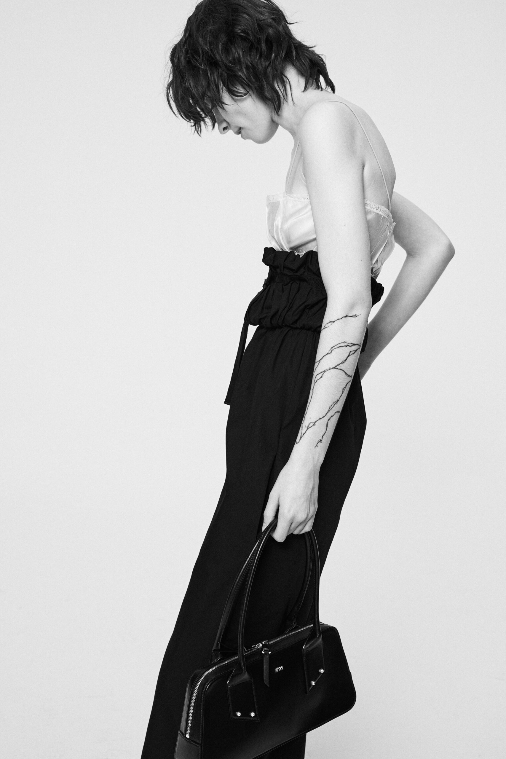 white silk sleeveless v-neck fitted top