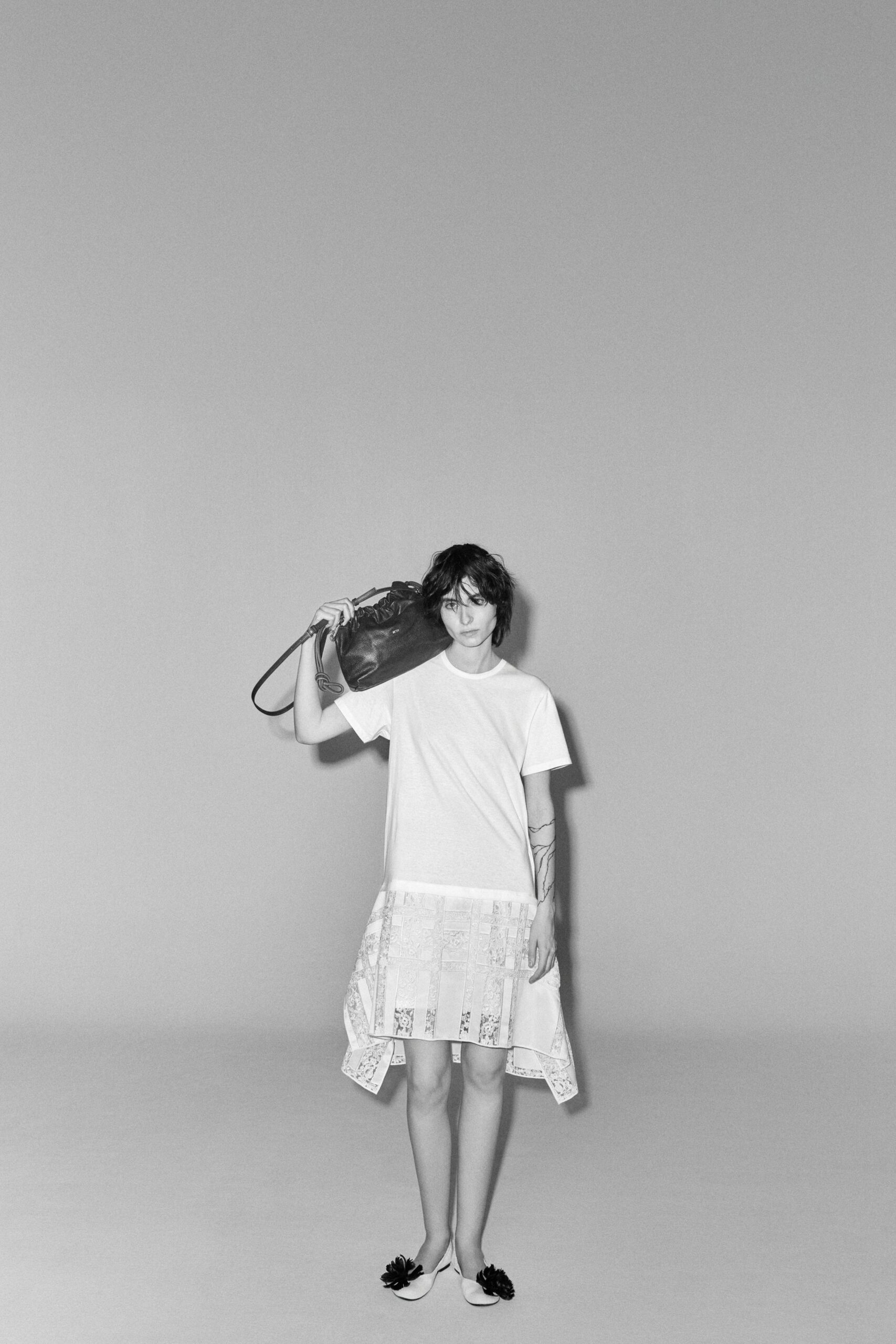 white cotton asymmetric fitted pleated mini skirt
