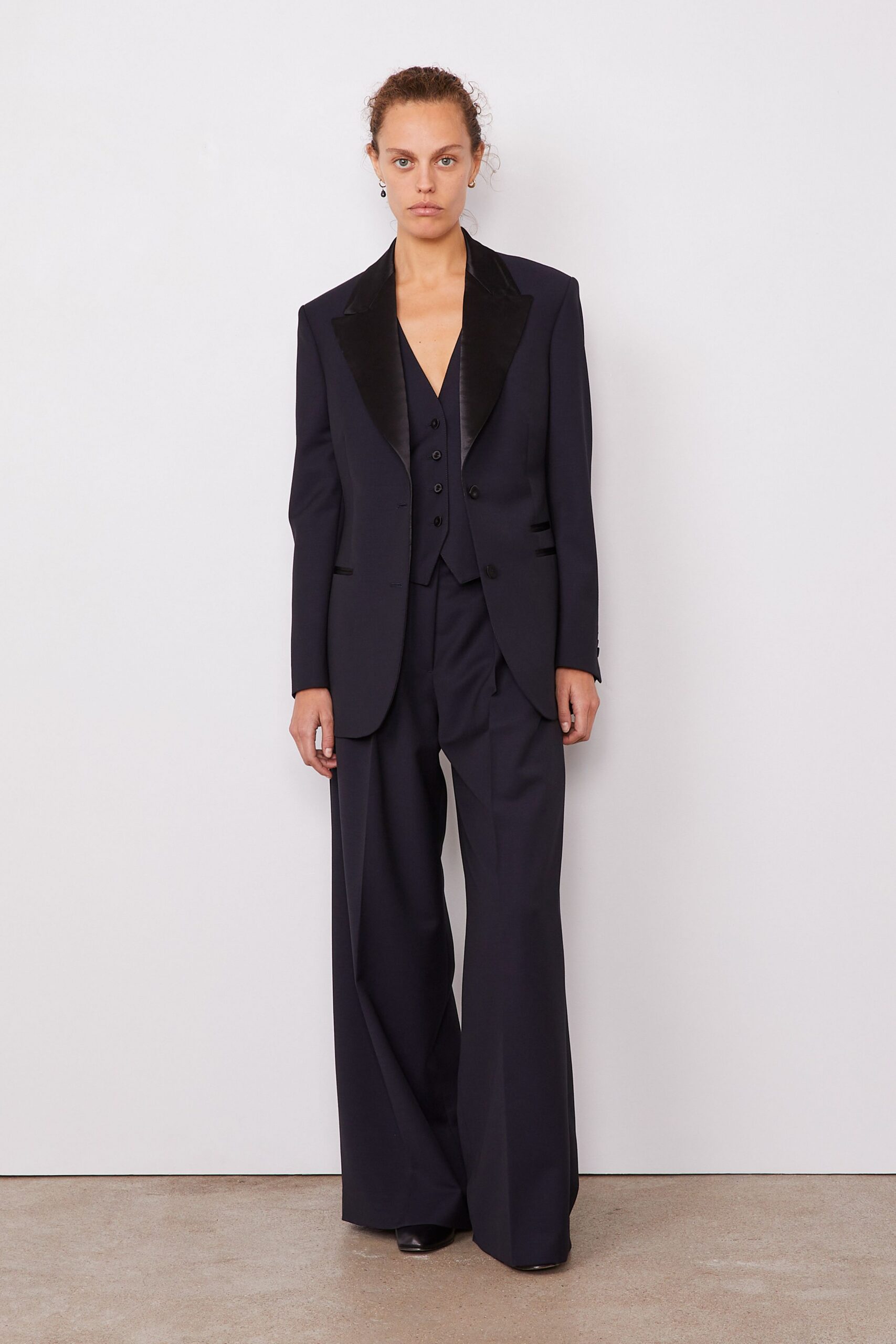 black wool long-sleeve v-neck tailored buttoned suit