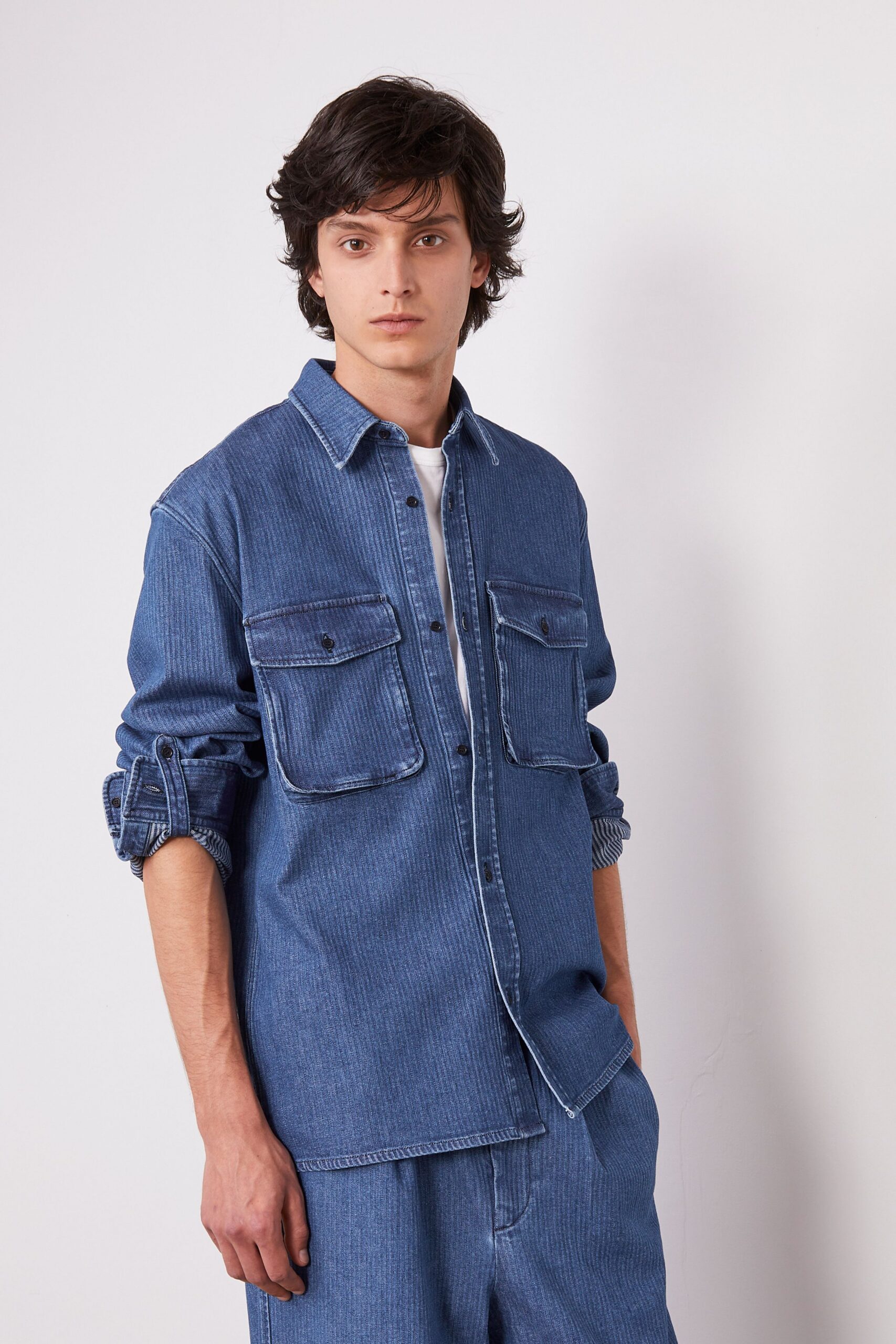 blue denim long-sleeve collared relaxed buttoned shirt