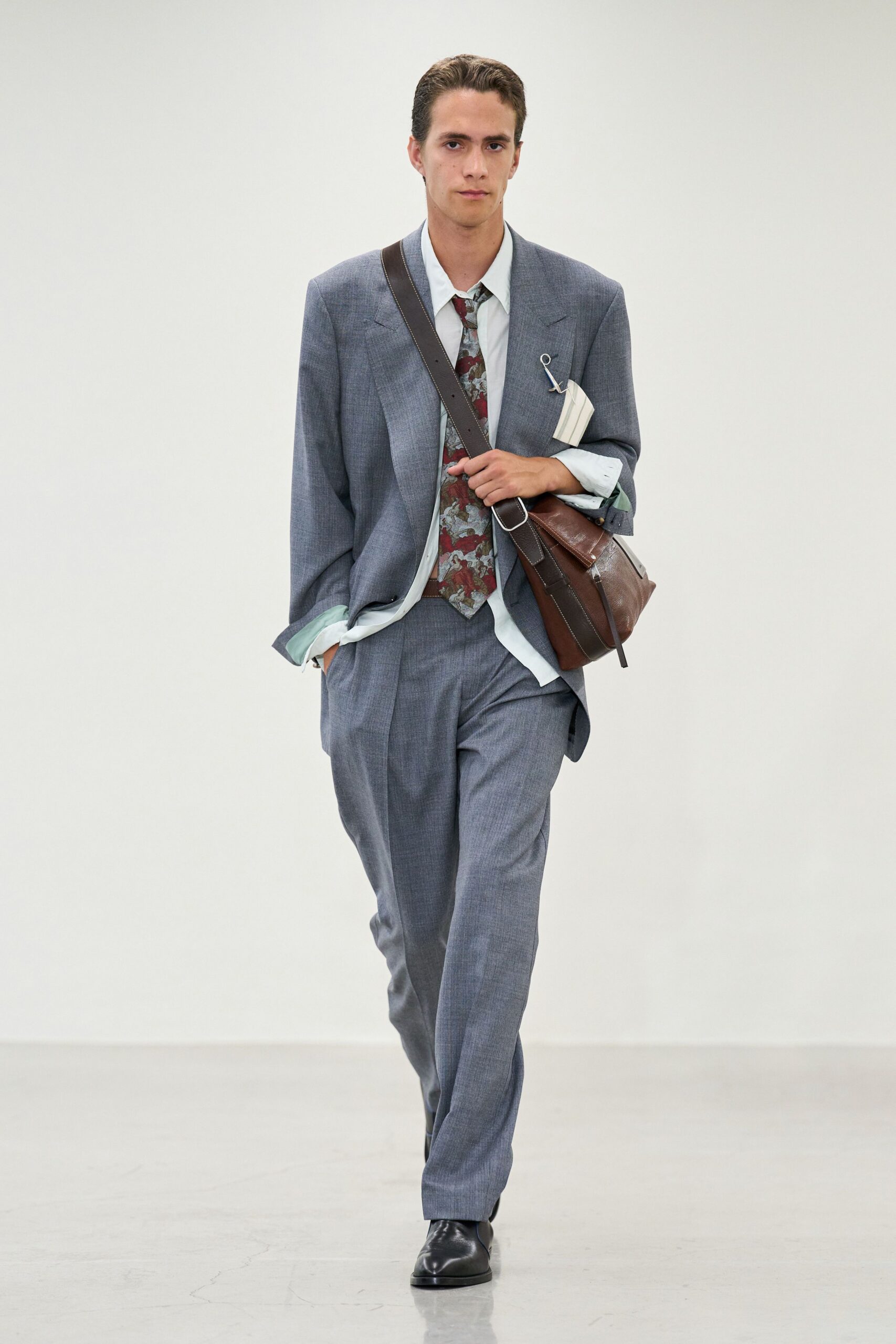 gray tailored suit with white shirt