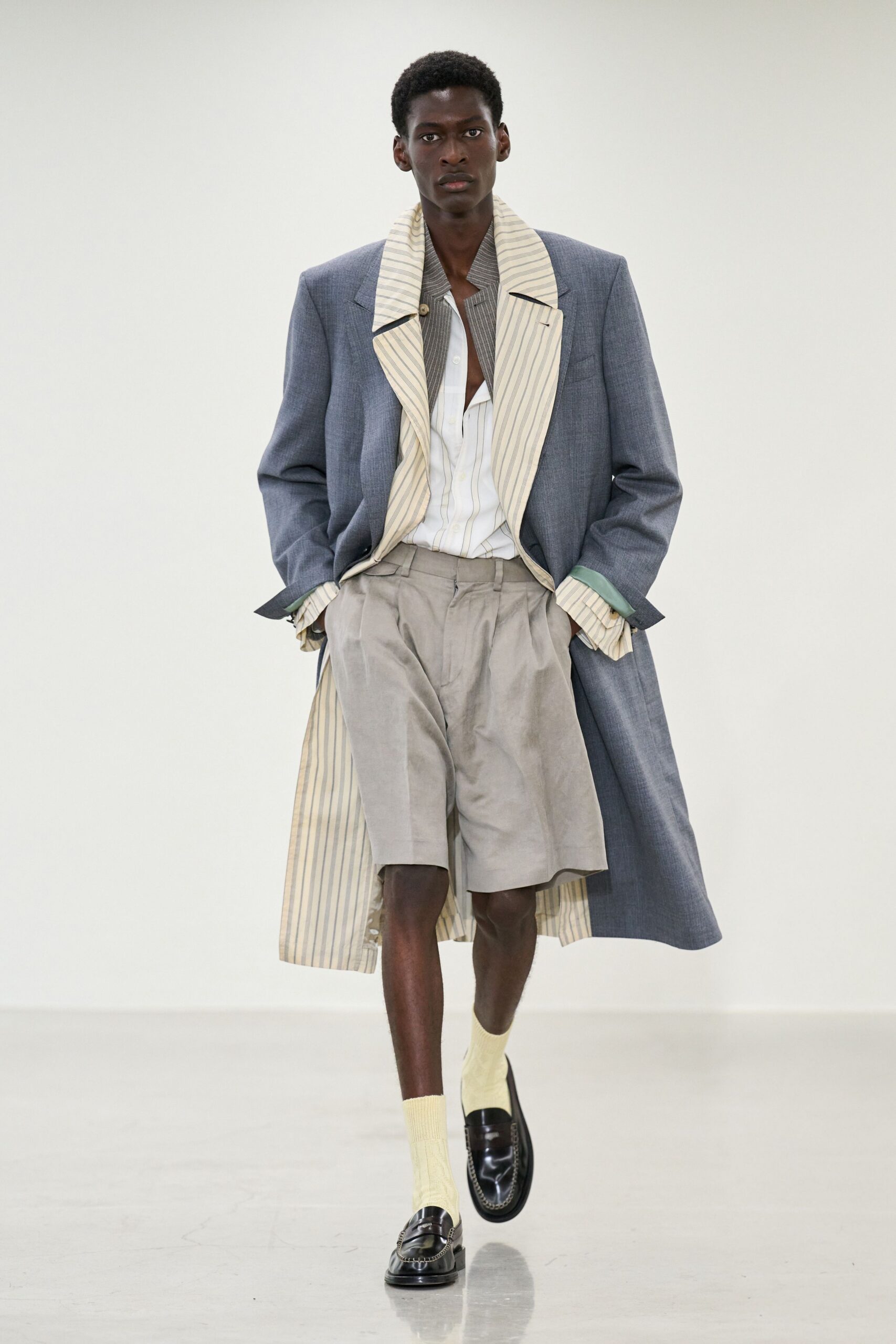 gray wool long-sleeve collared structured buttoned layered coat