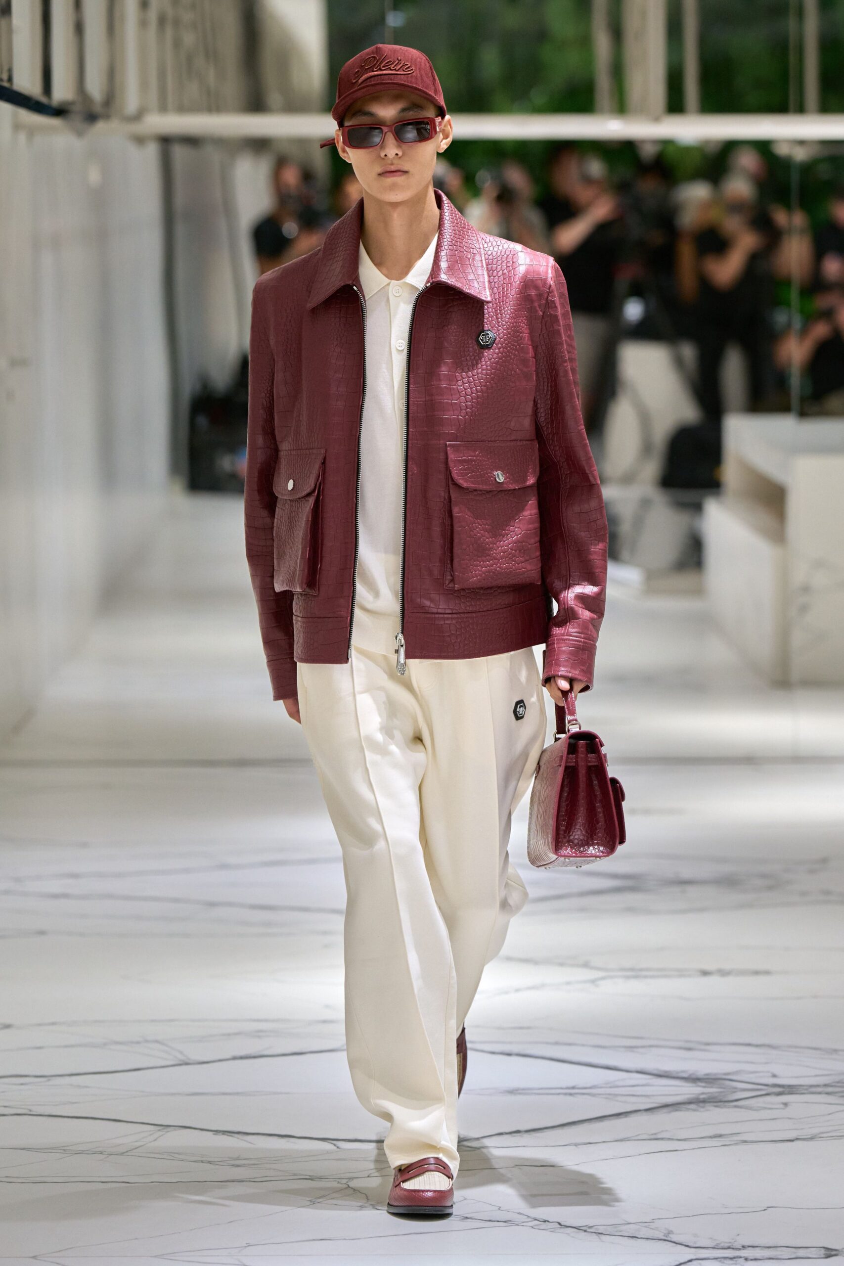 red leather long-sleeve collared structured zippered pockets jacket