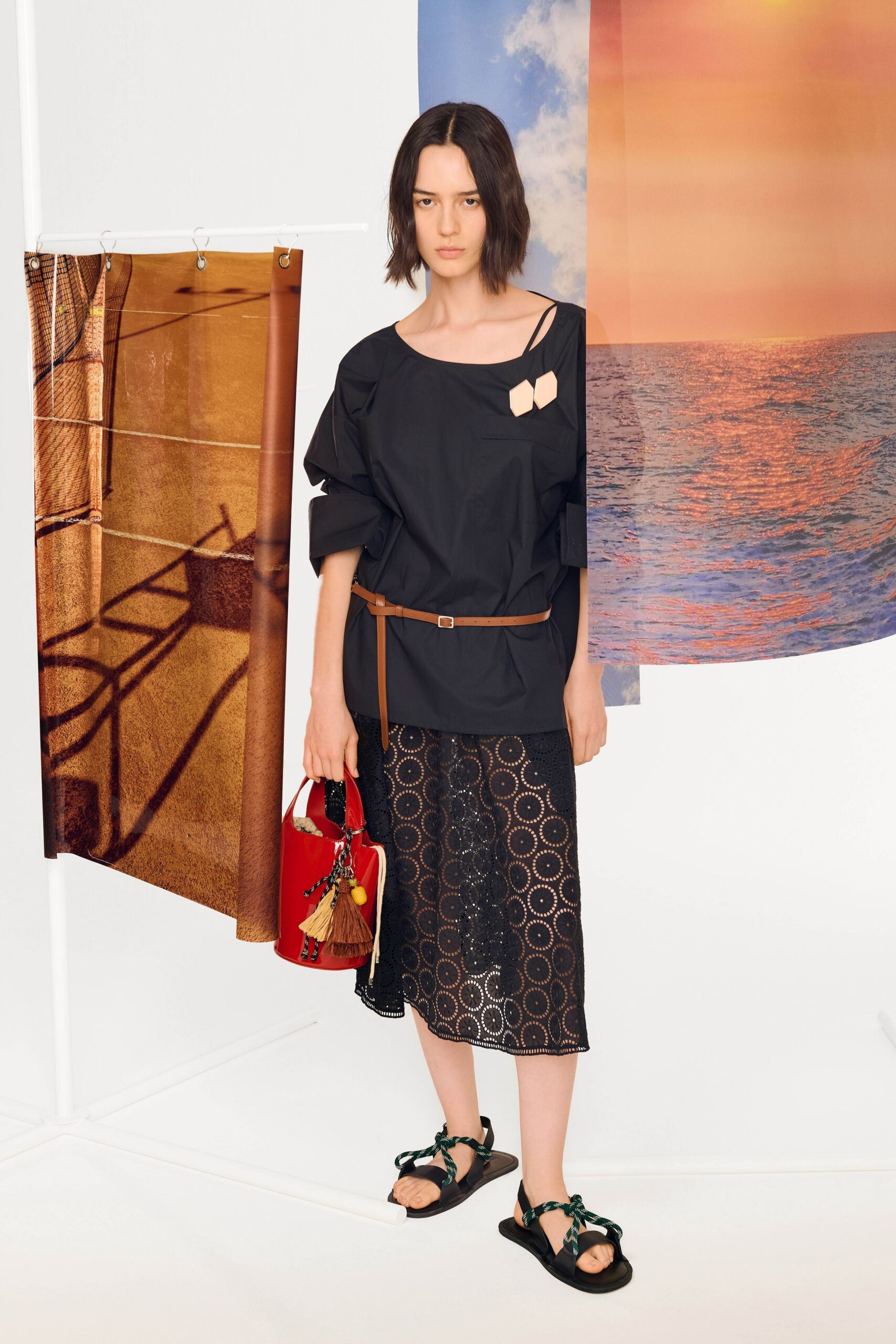 black relaxed top with lace skirt