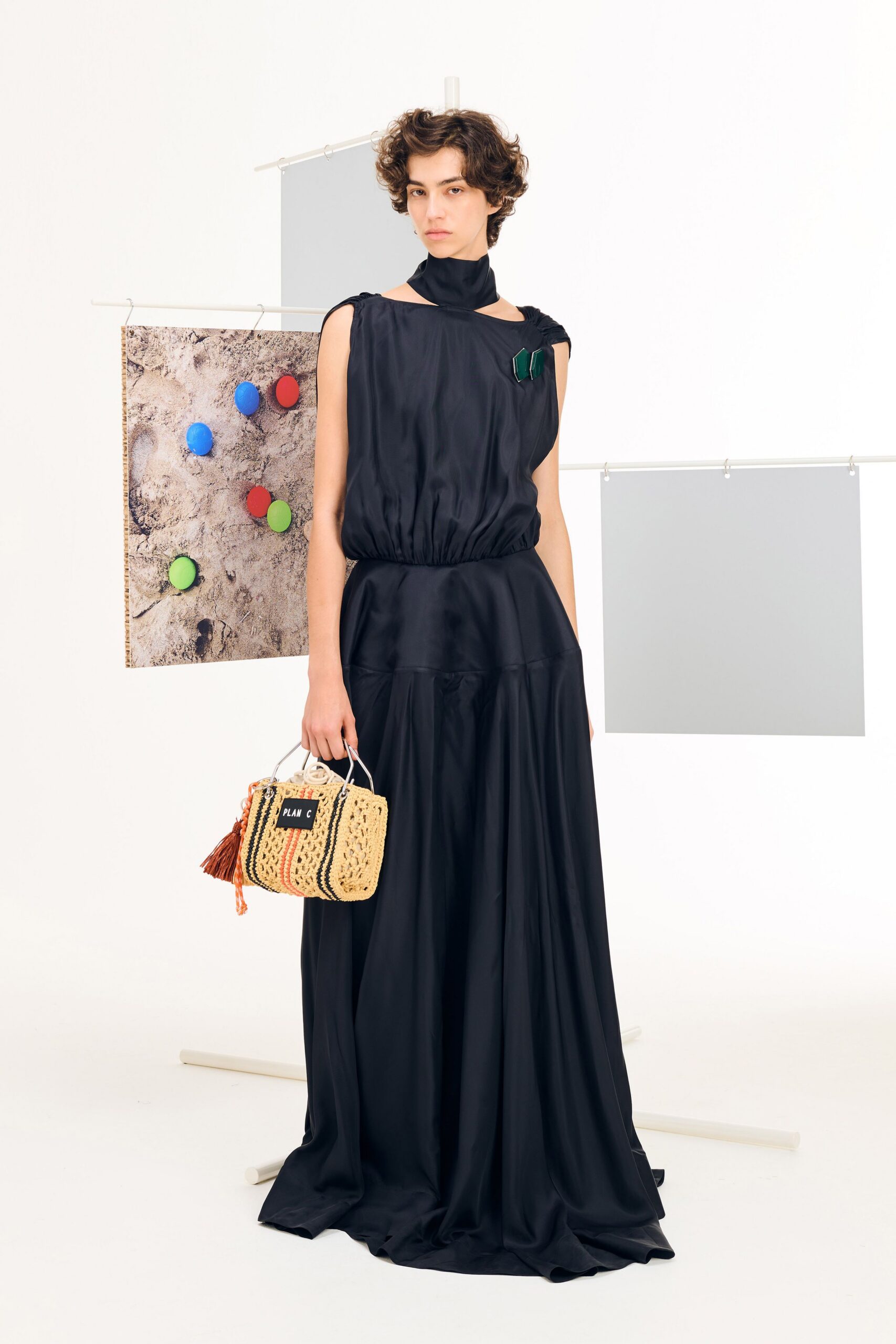 black silk sleeveless high-neck fitted draped tiered gown