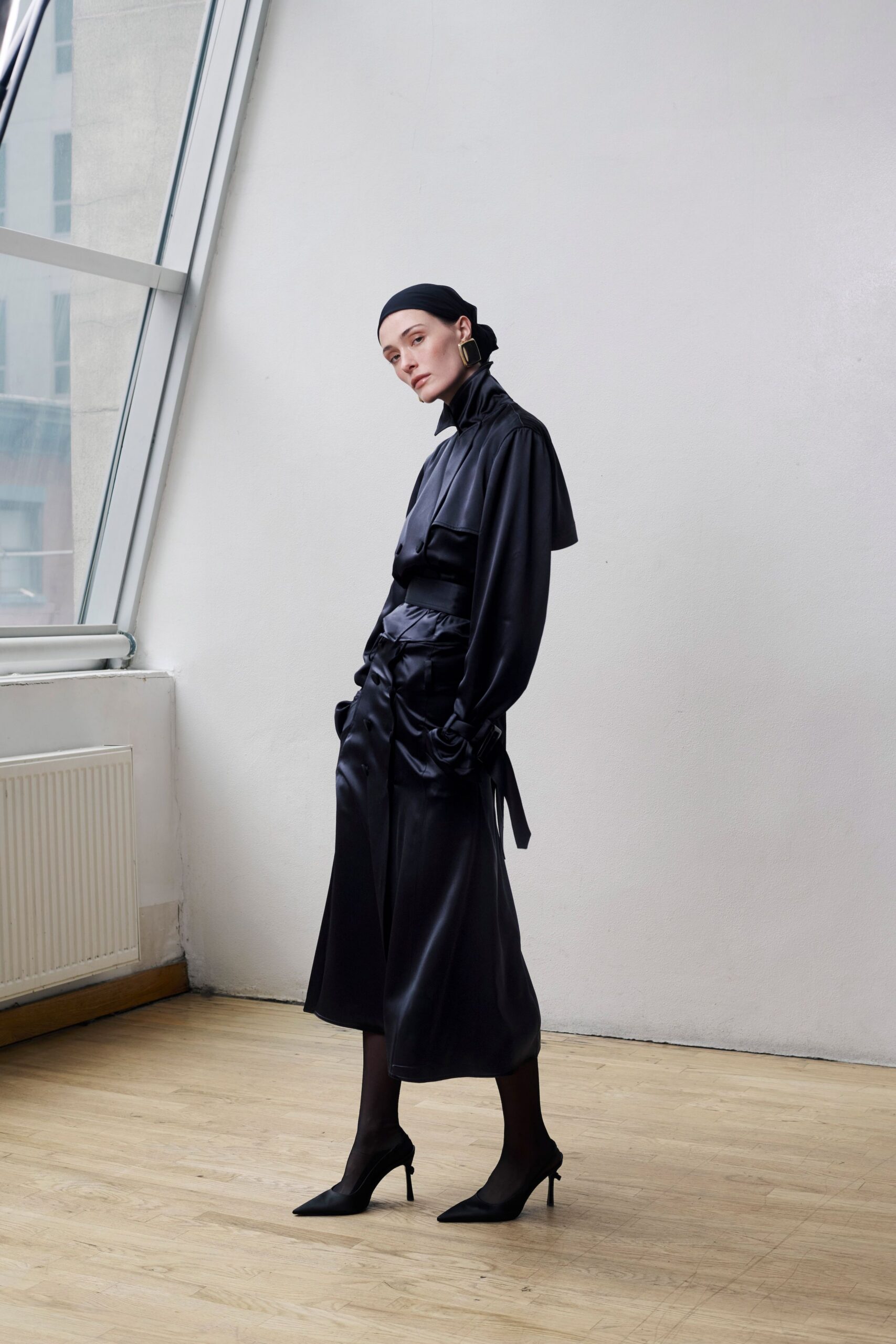 black silk long-sleeve high-neck fitted draped belted dress