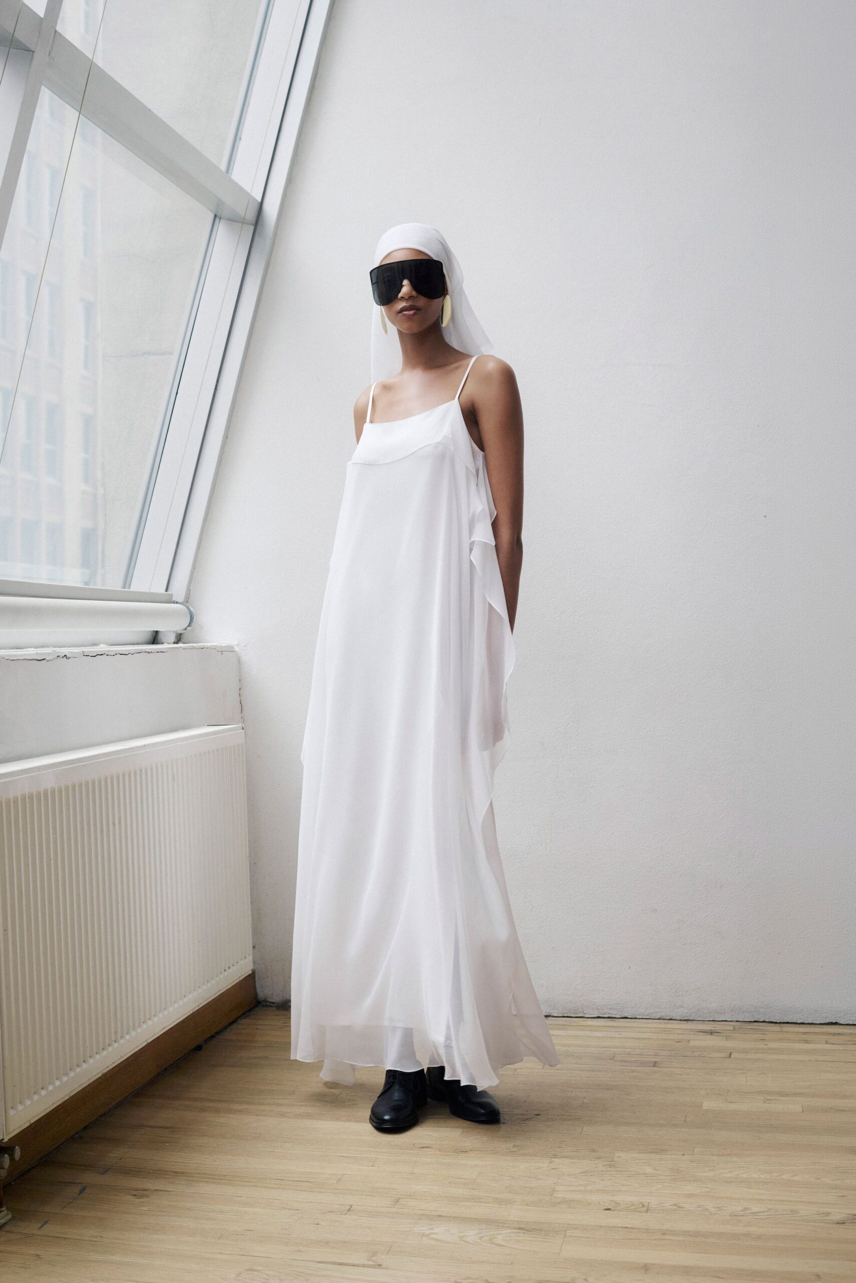 white flowing maxi gown