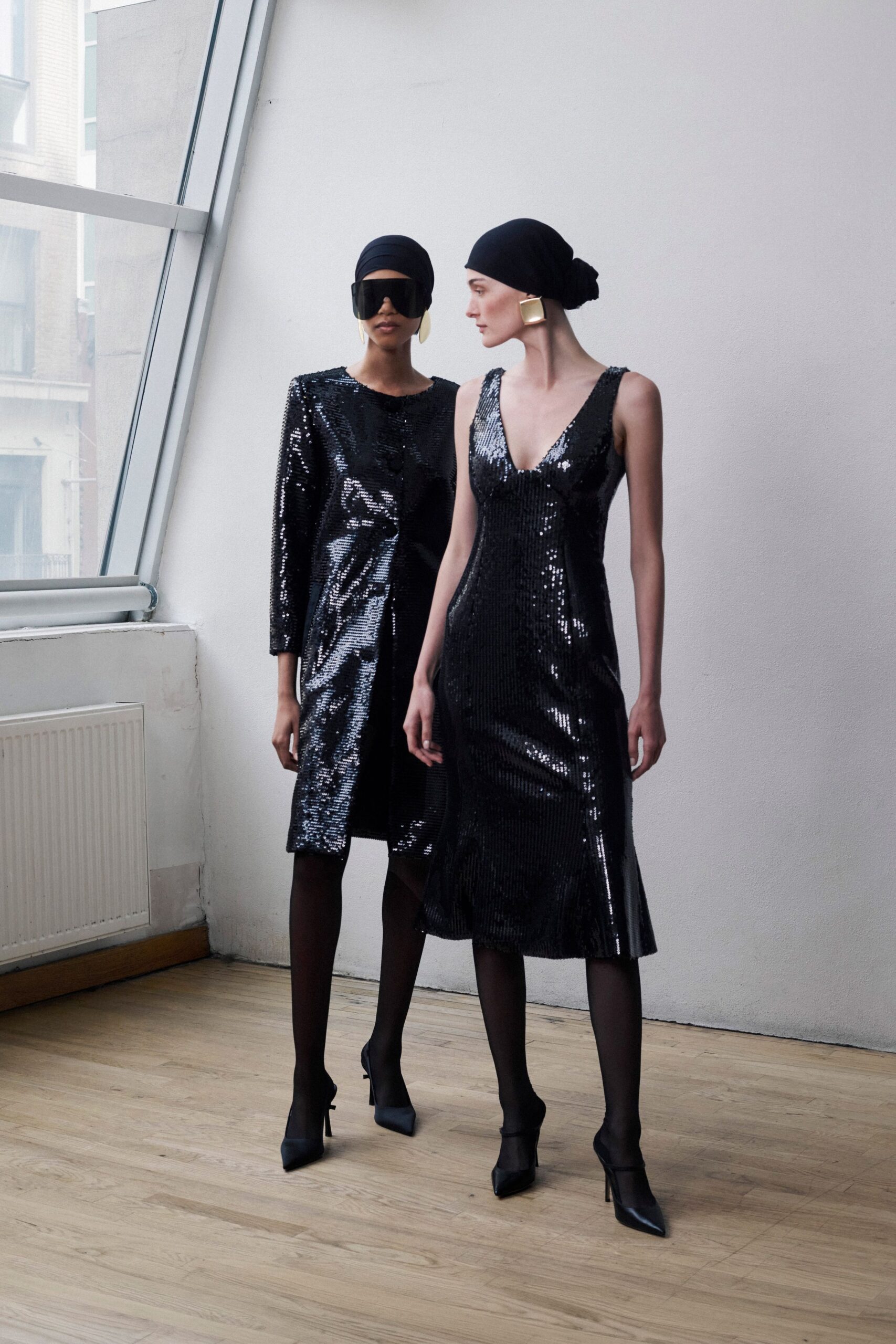 black sequin sleeveless v-neck fitted pleated shiny dress