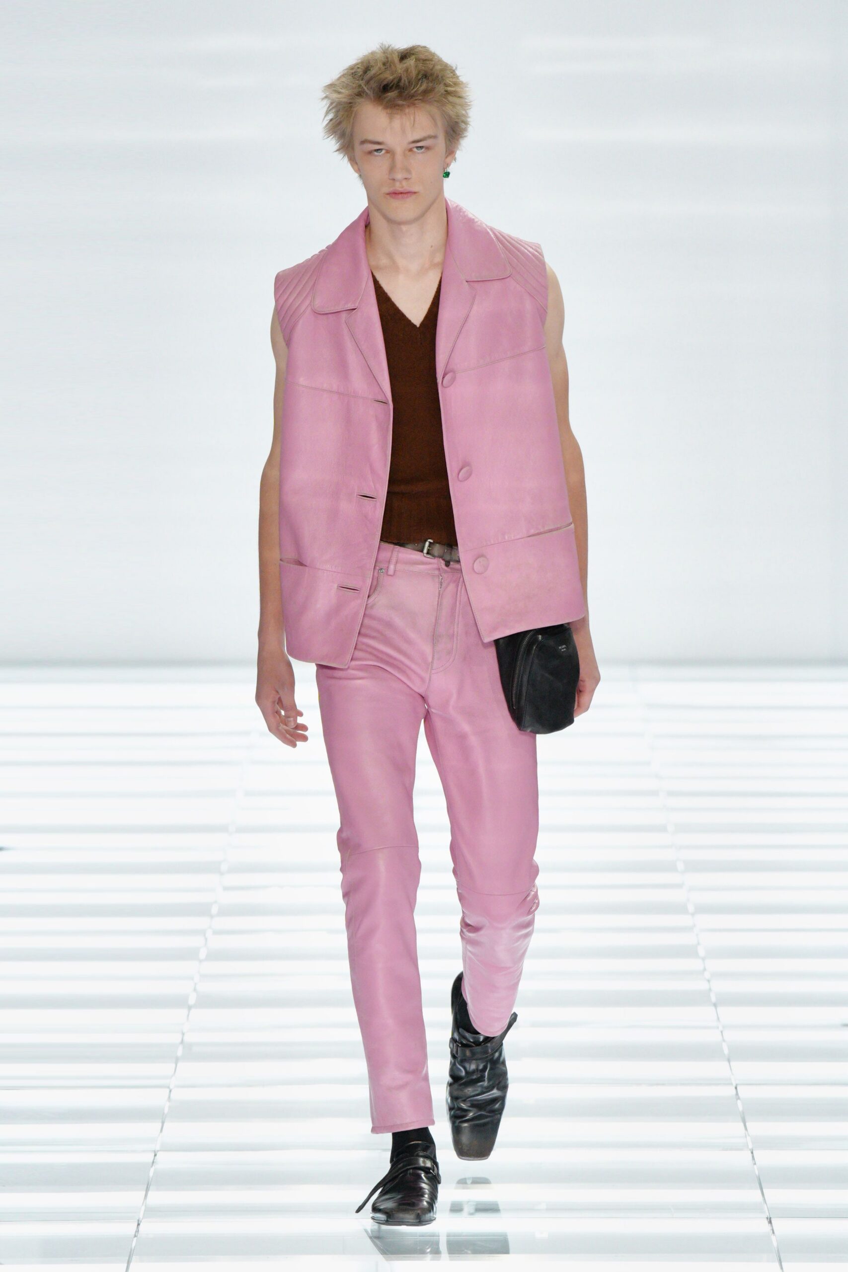 pink leather vest with brown shirt