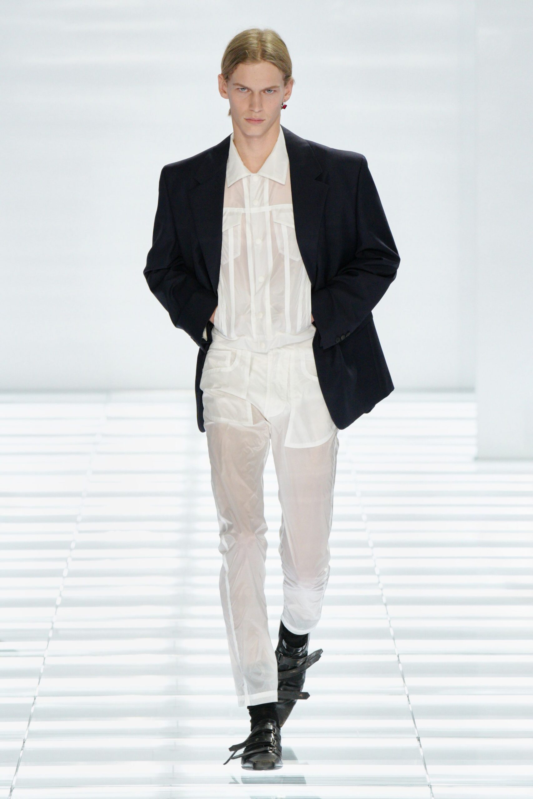 black blazer white shirt white pants