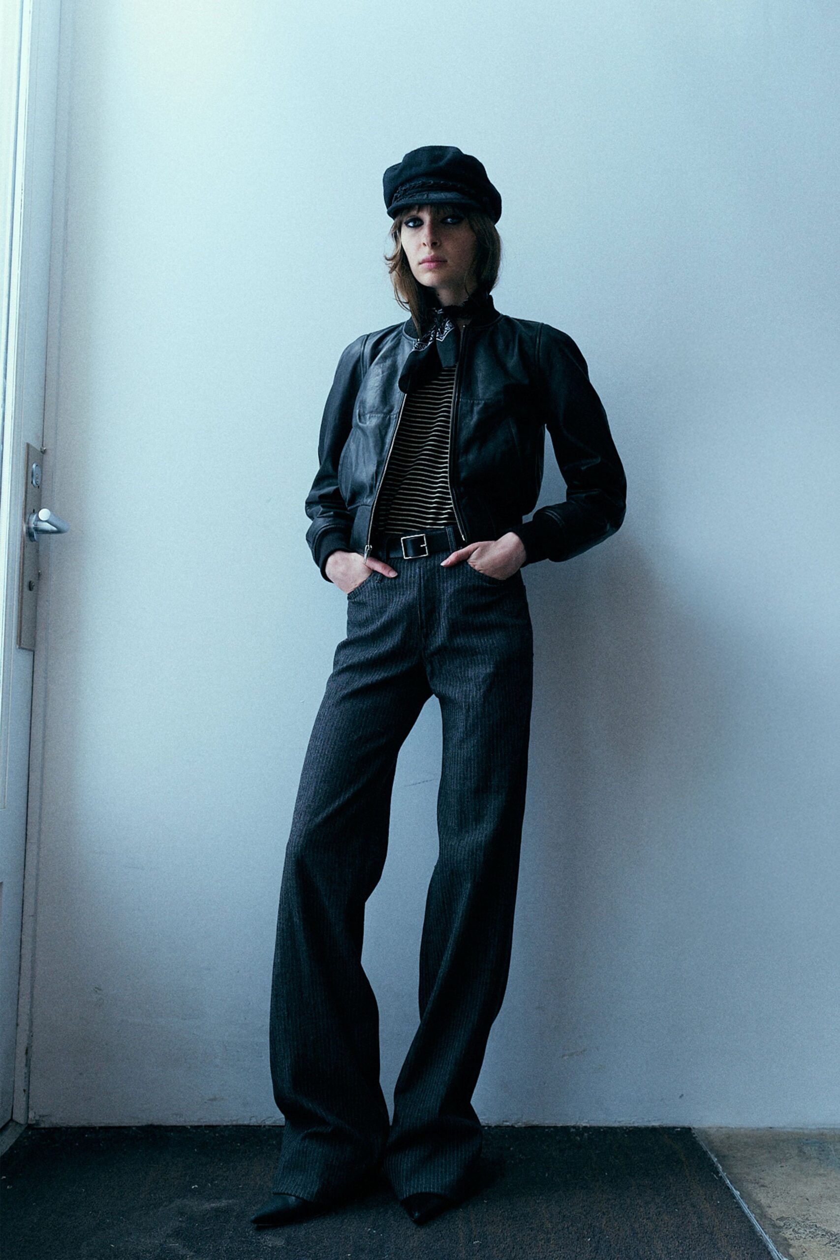black leather jacket with striped top