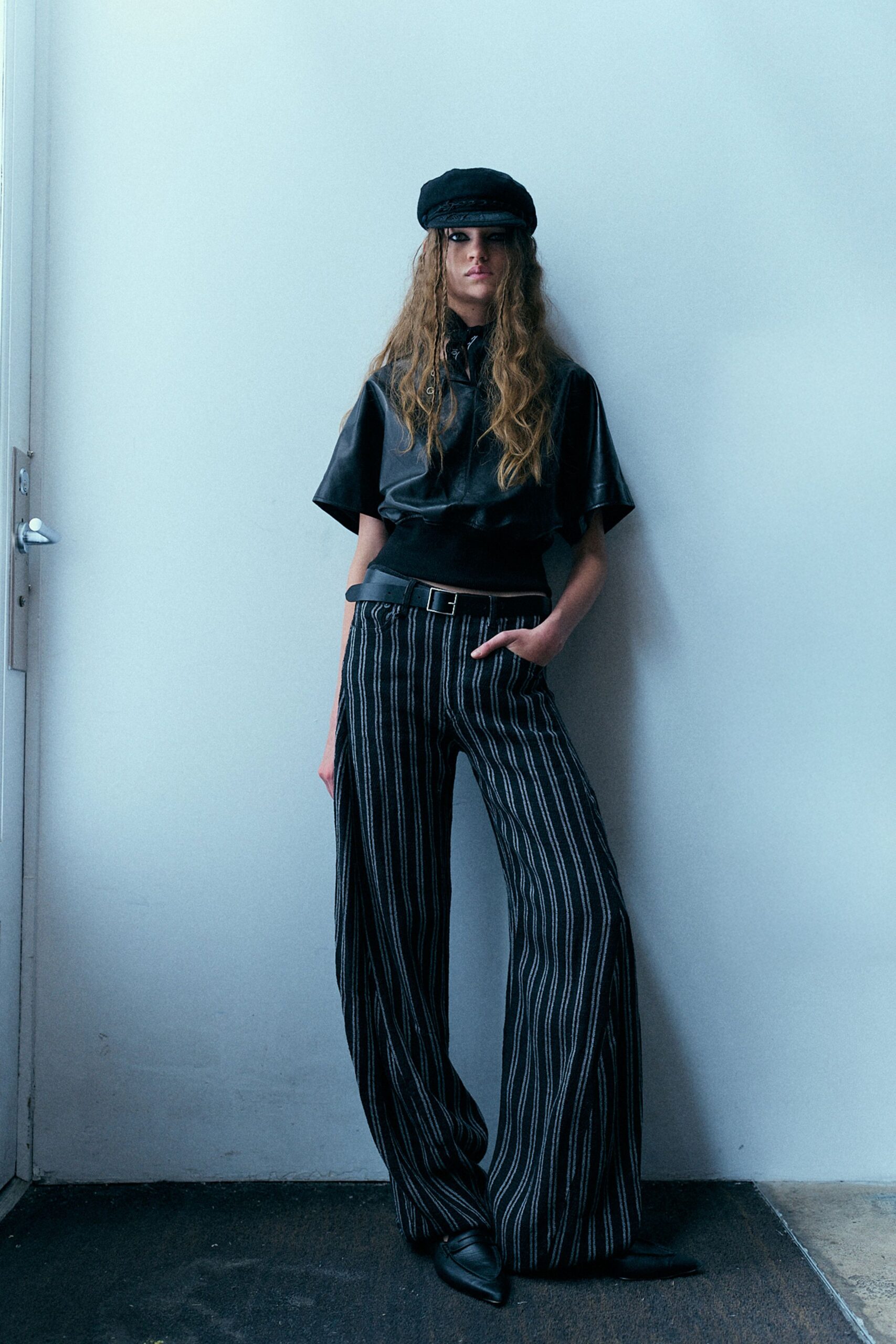 black leather top with striped pants