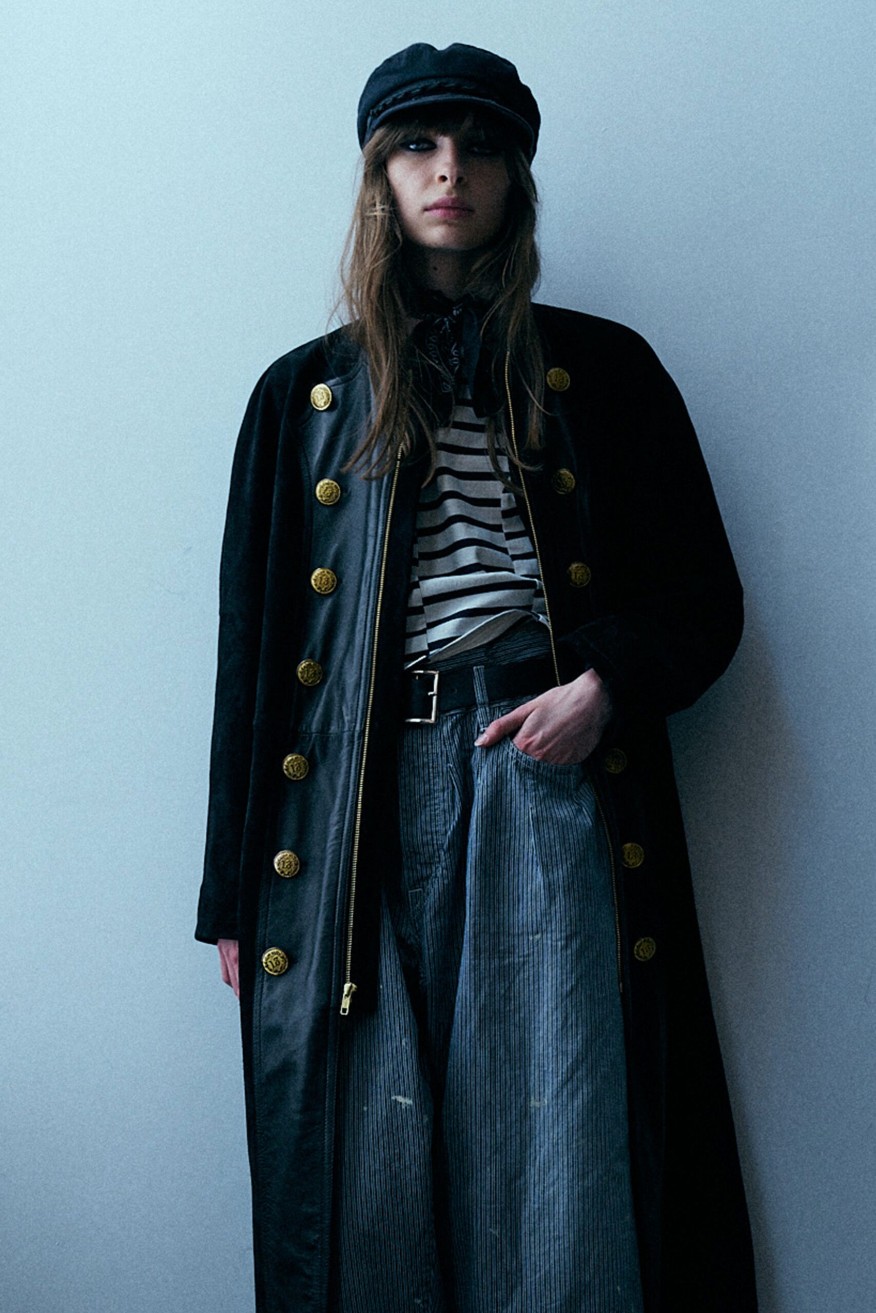 black suede coat with striped shirt
