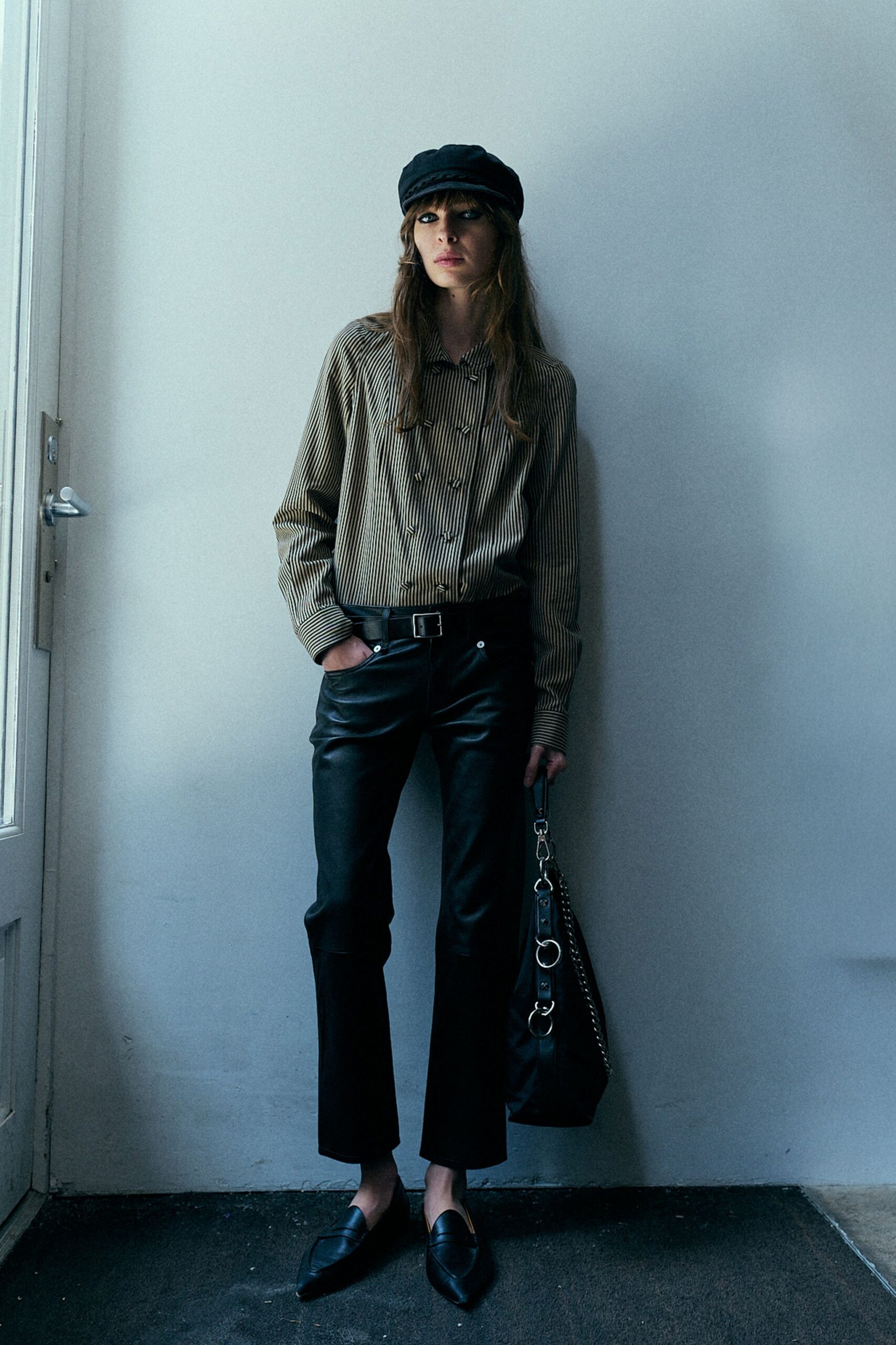 black leather pants with striped shirt