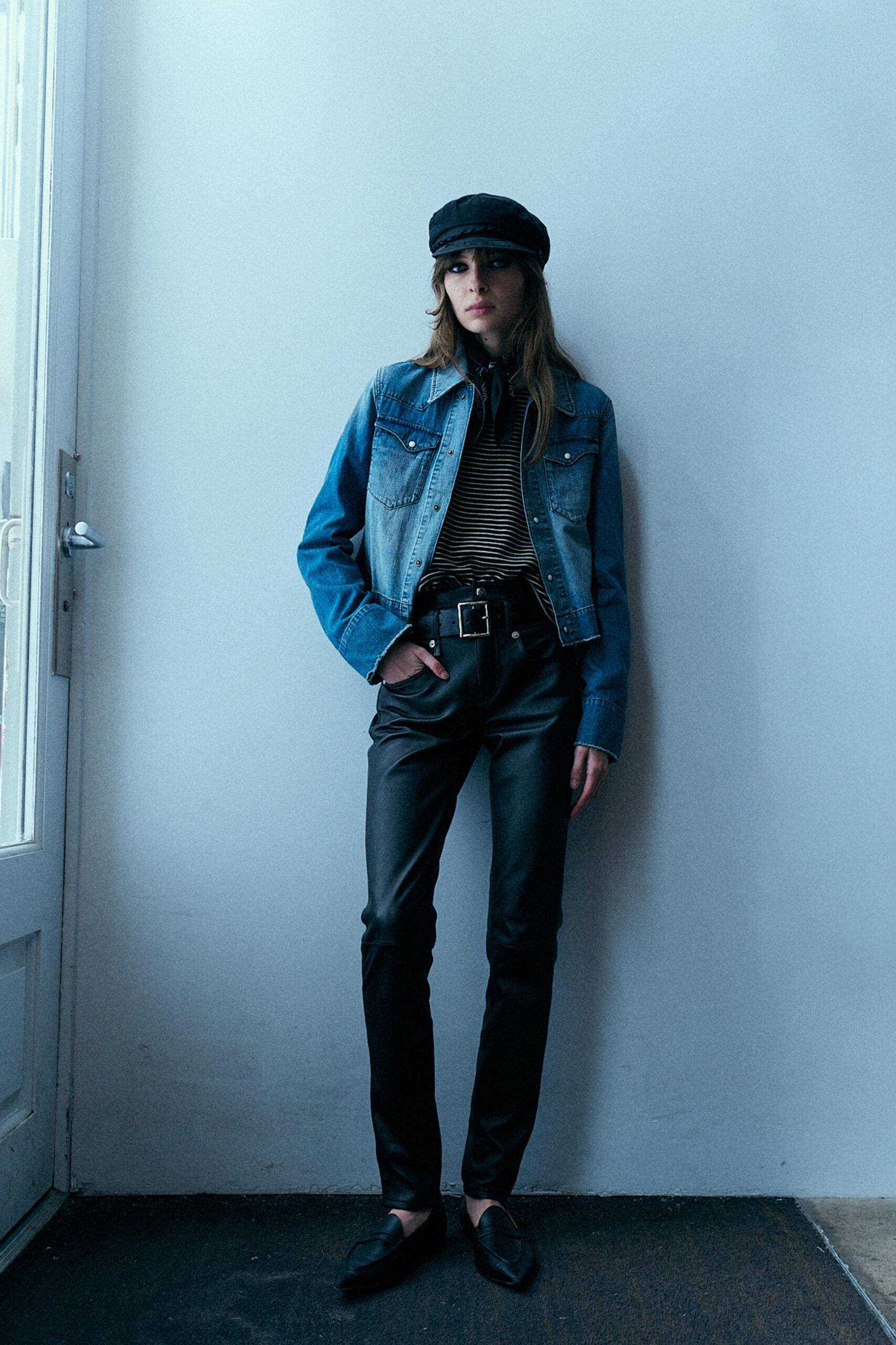 blue denim jacket with black leather pants