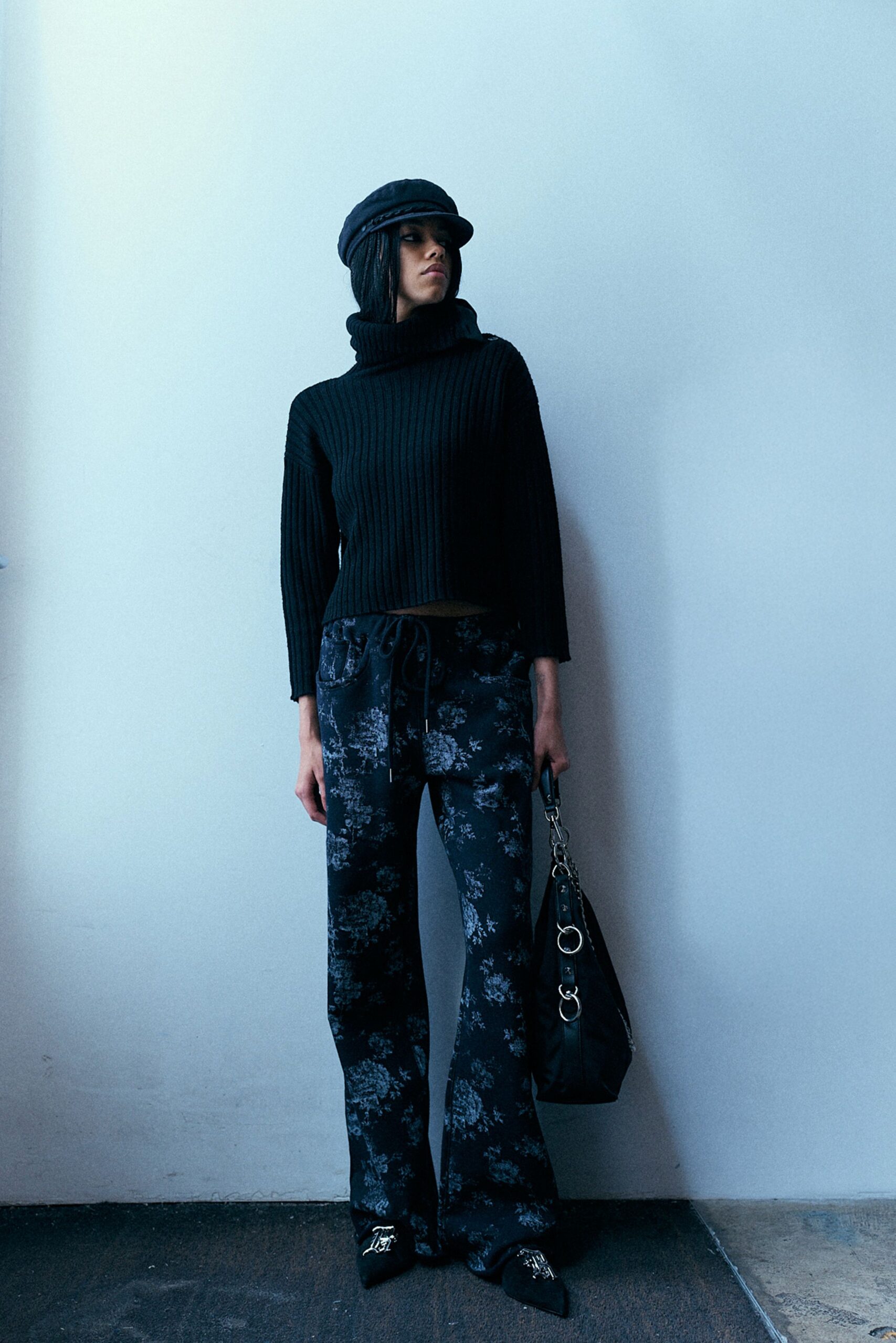 black knit top with flared pants