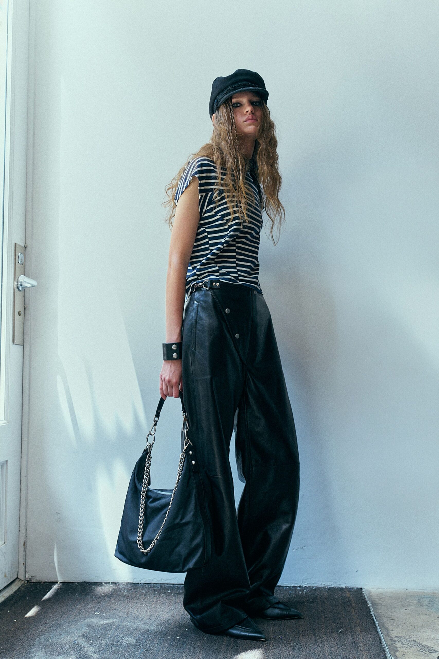 black striped top with leather pants