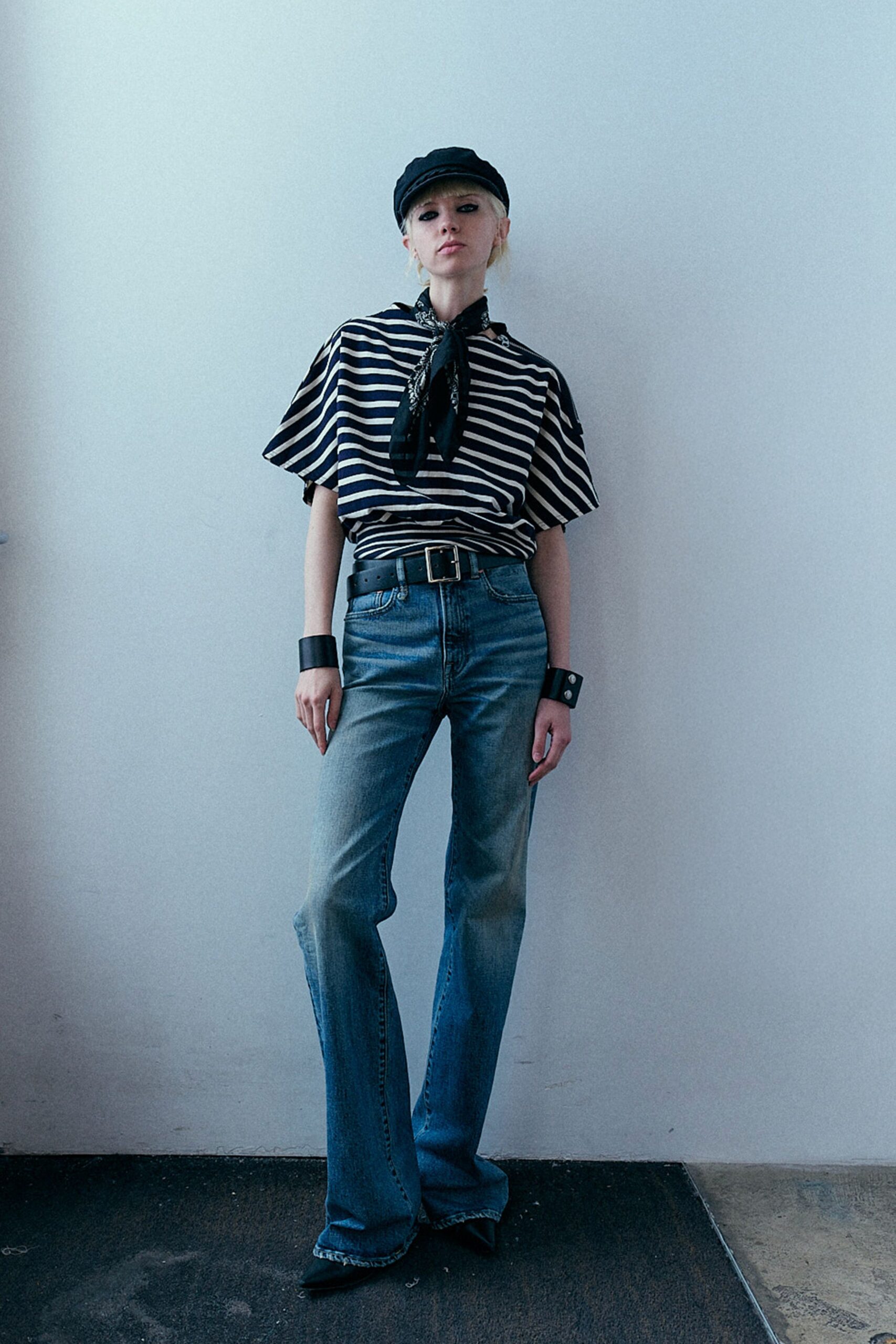 striped top with flared jeans