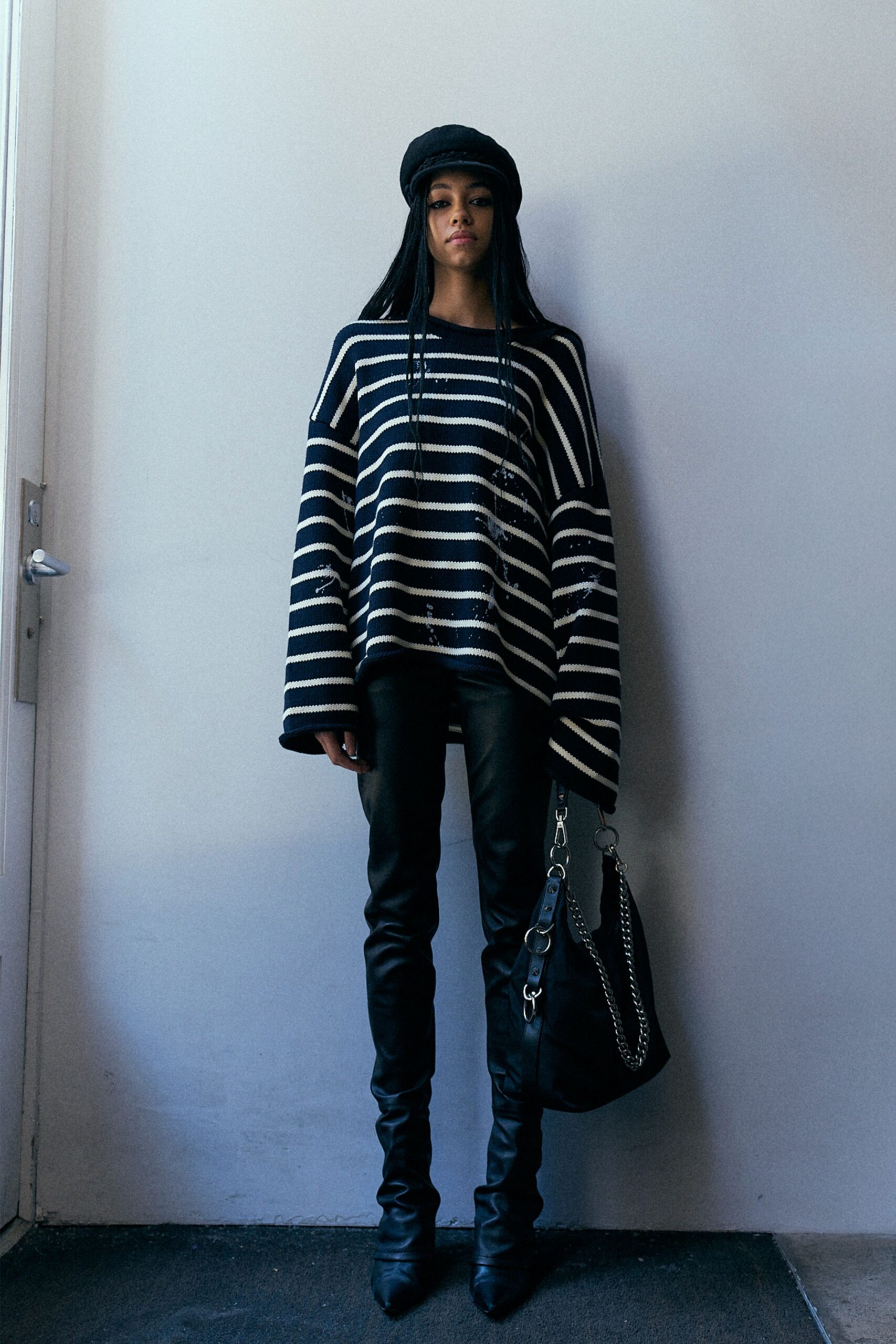 oversized striped sweater with leather pants