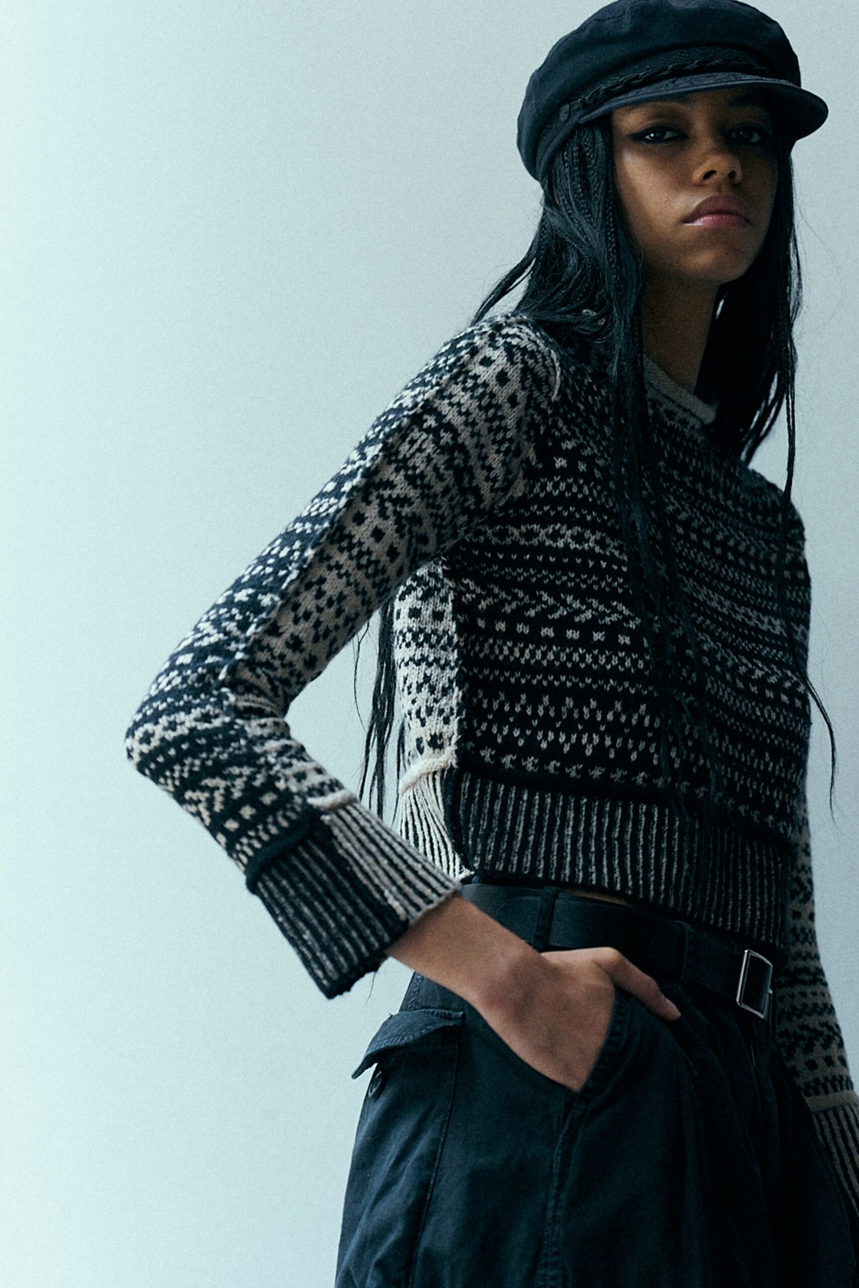 black and white cropped sweater with relaxed pants