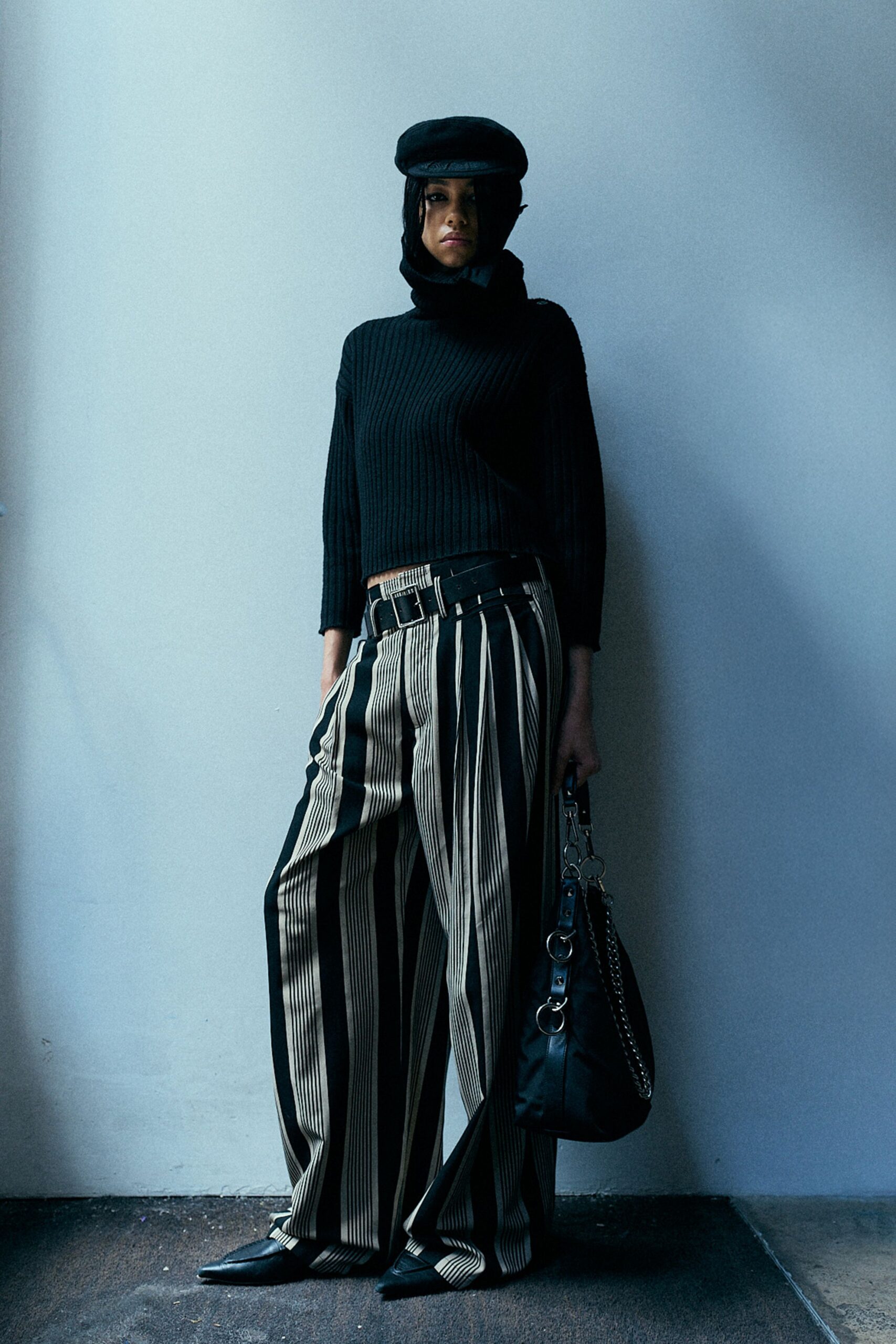 black cropped top with striped pants
