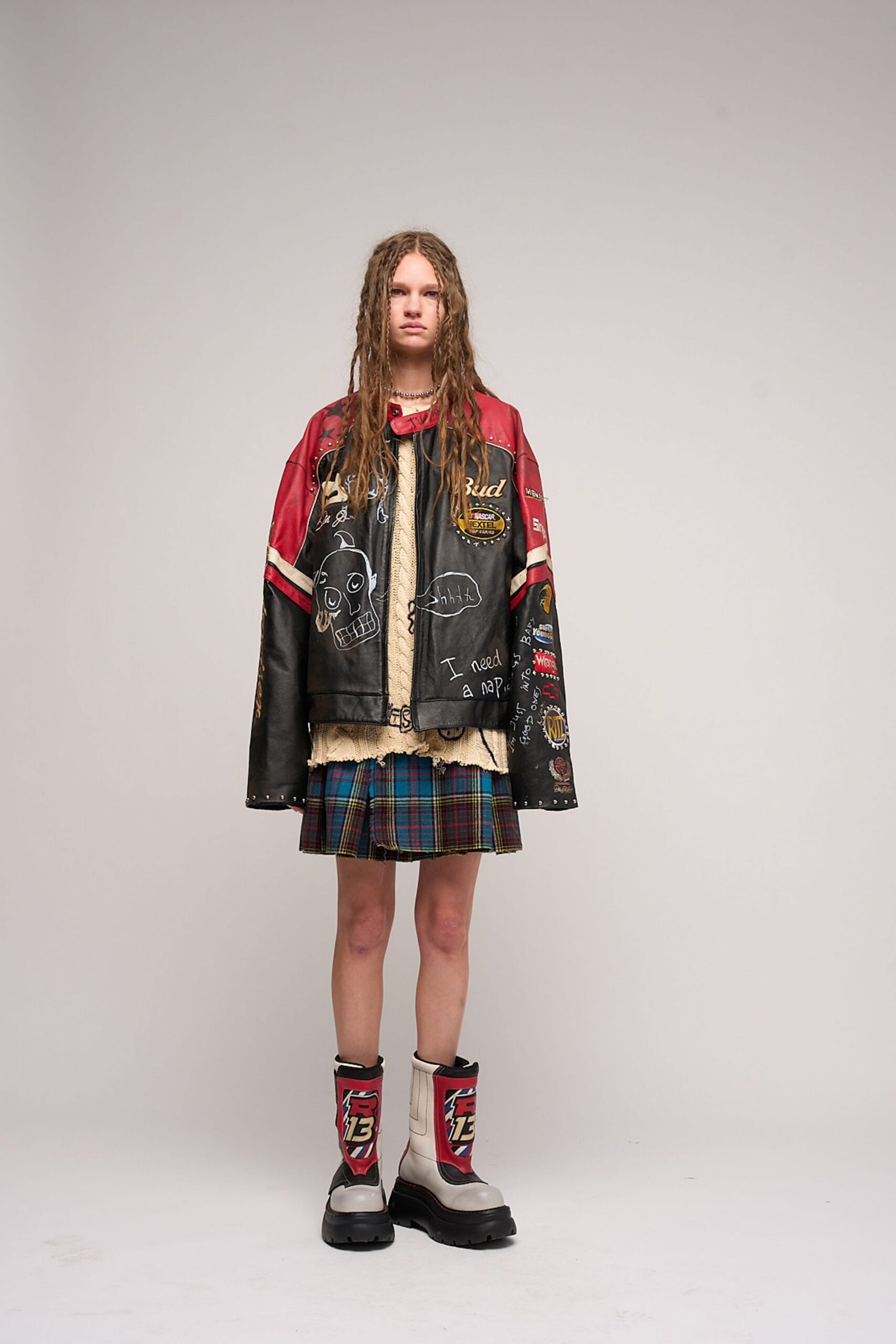 relaxed leather jacket with pleated skirt