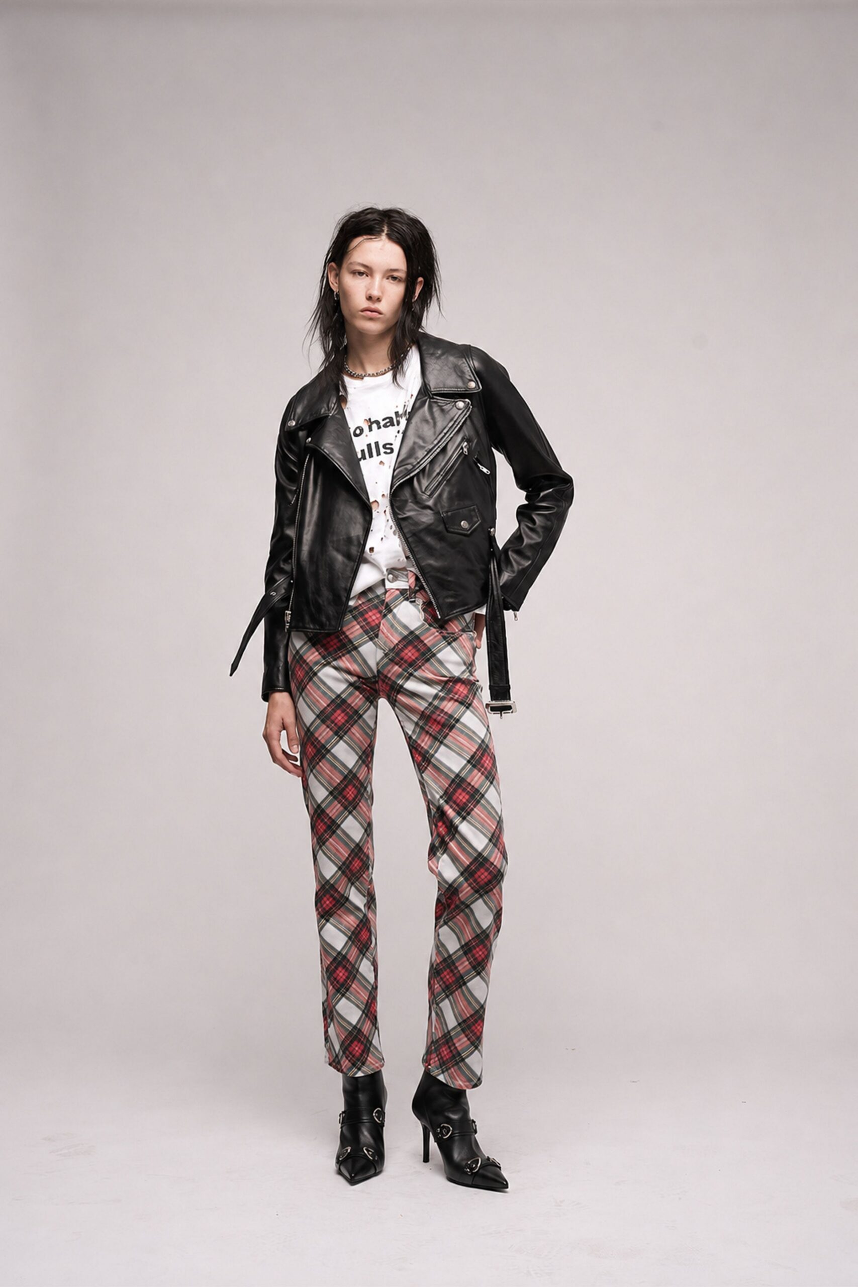 black leather jacket with plaid pants
