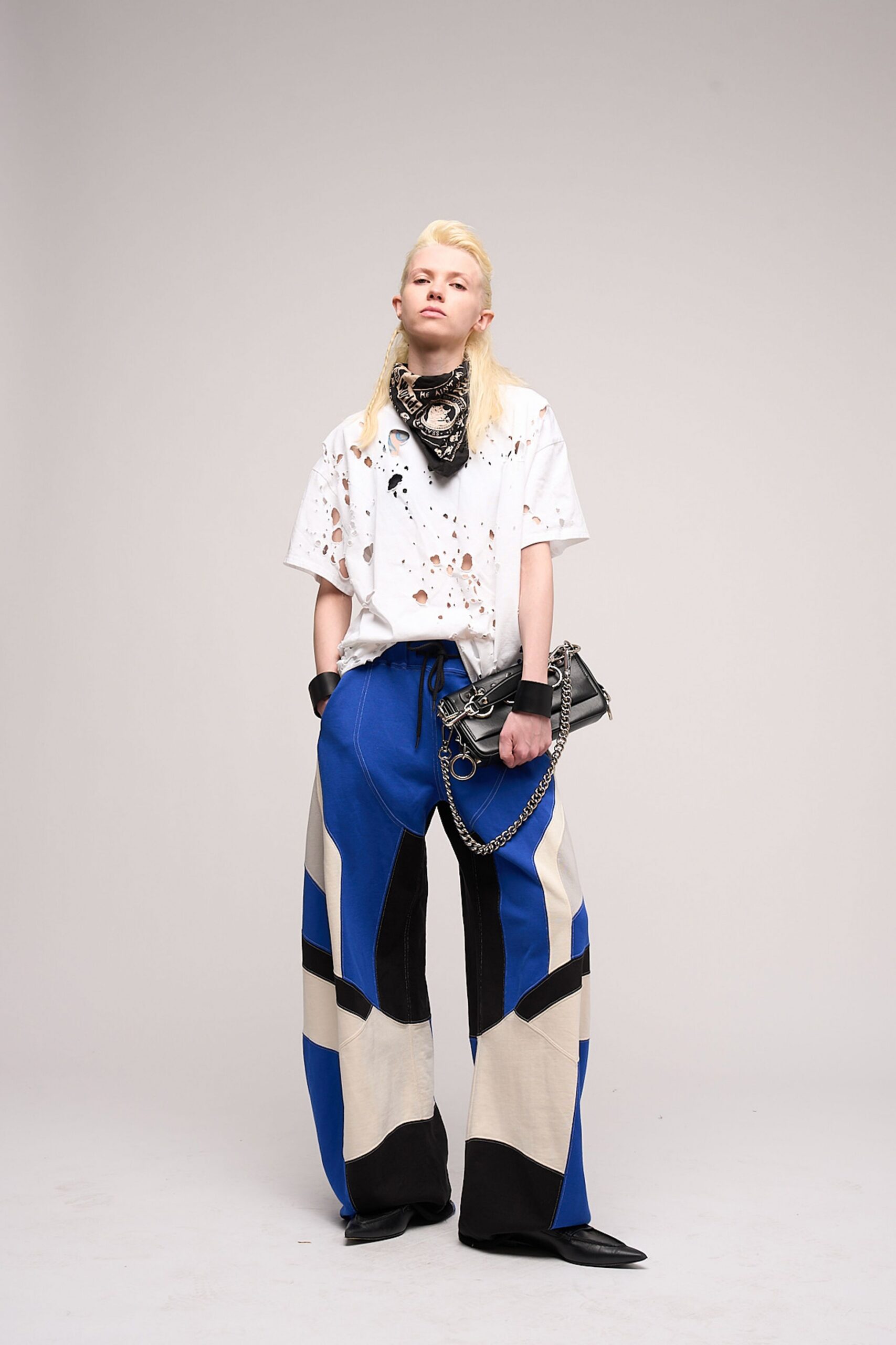distressed white t-shirt with wide-leg pants