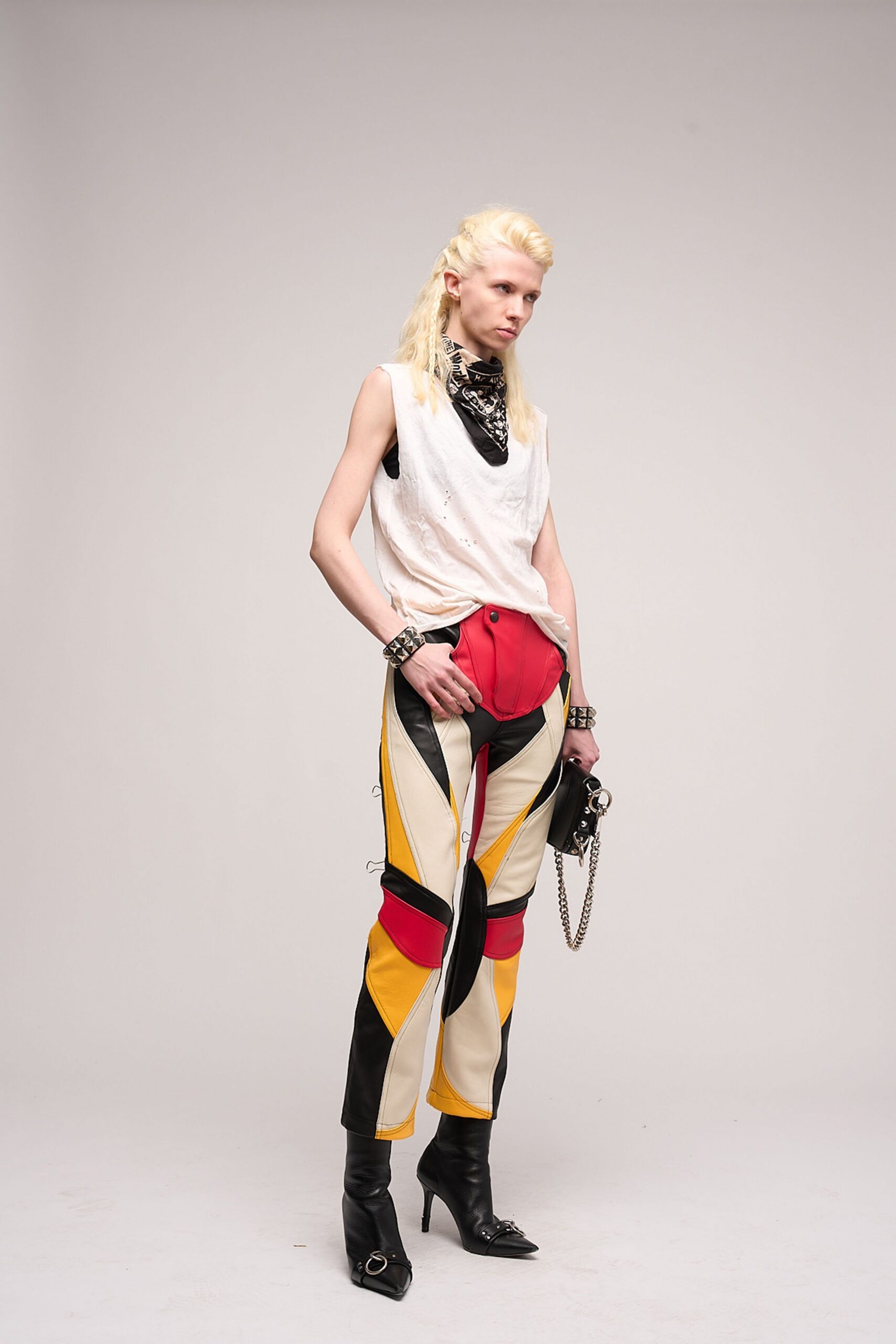 white relaxed top with color-blocked pants