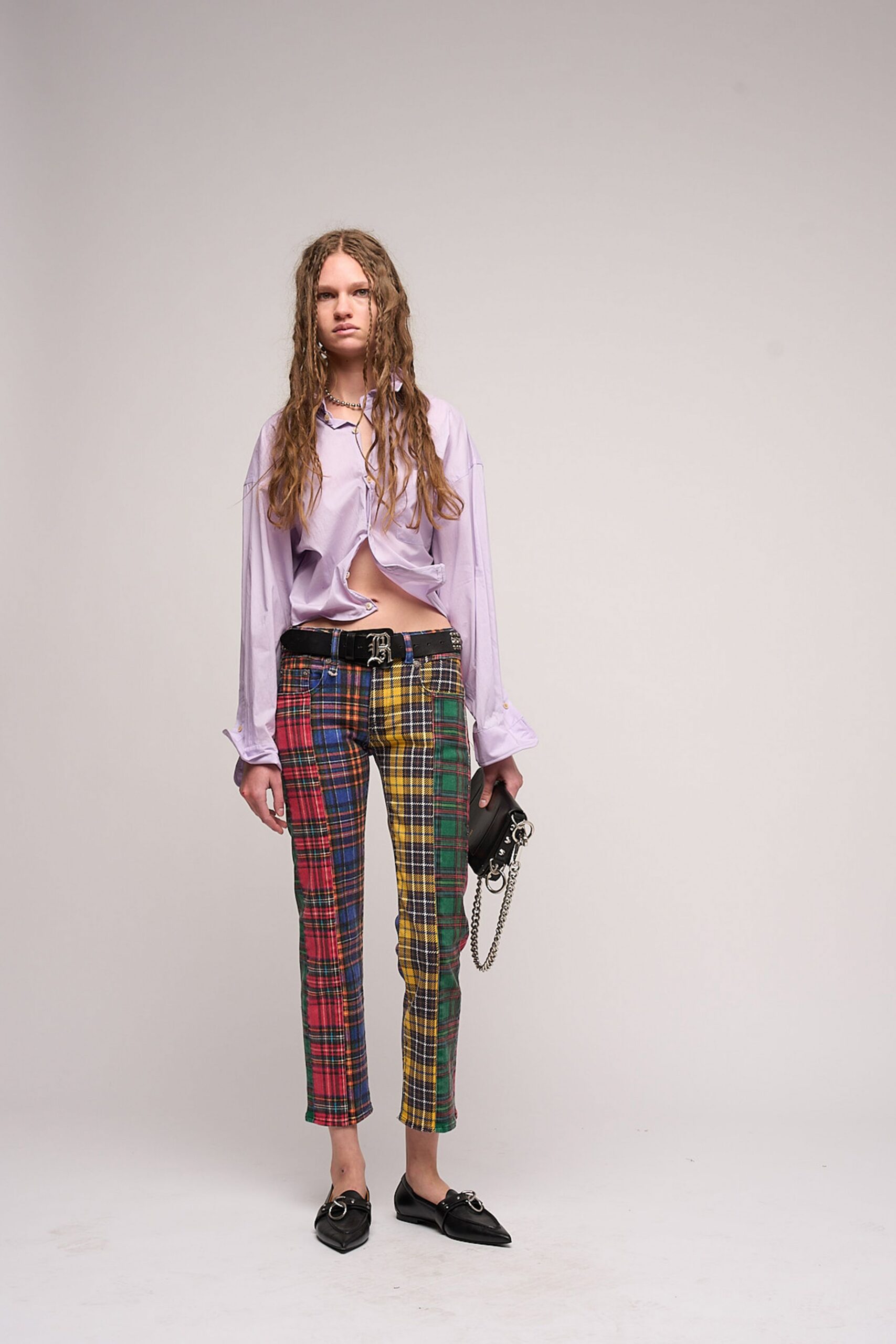 purple shirt and plaid pants