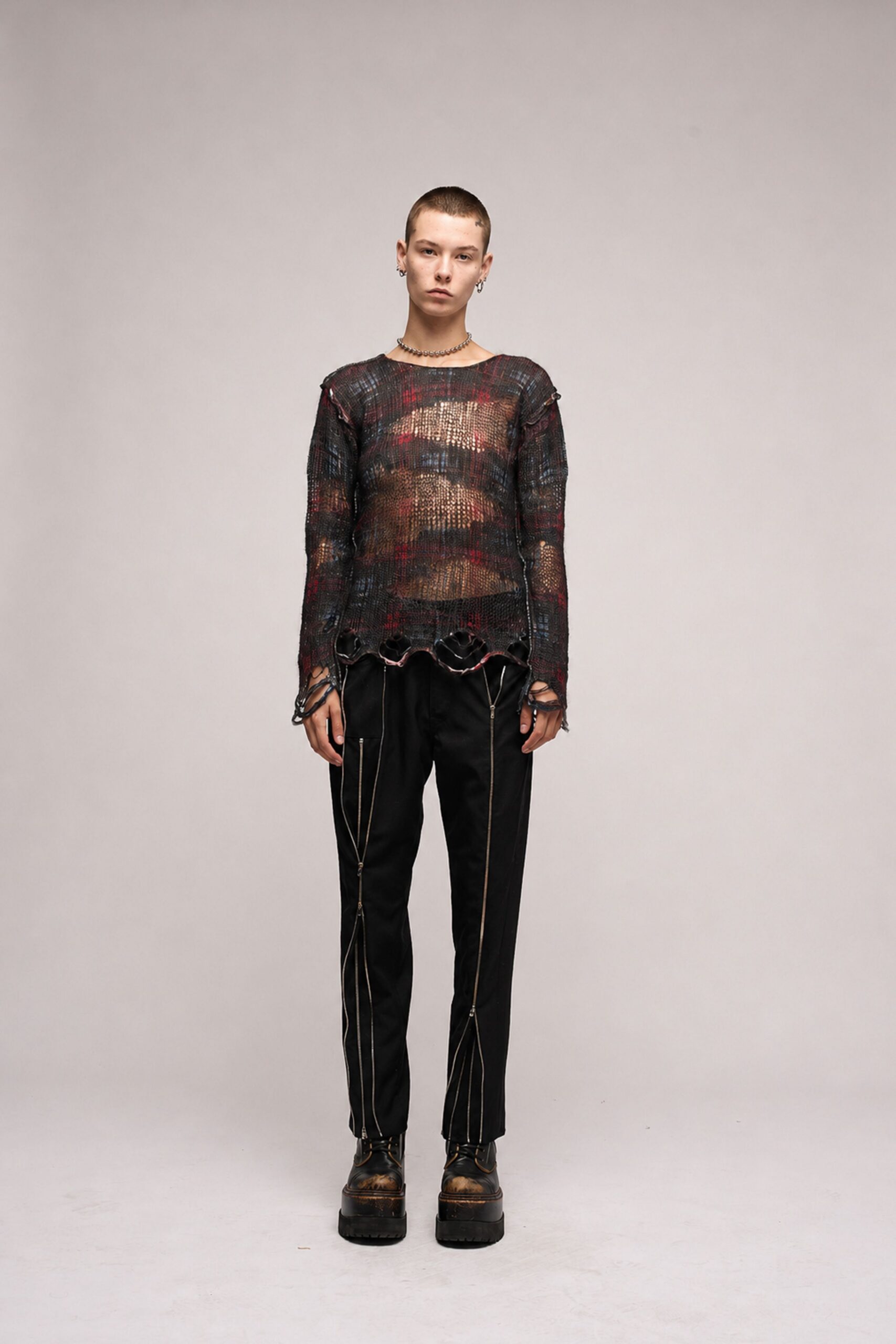 black relaxed top with slim pants
