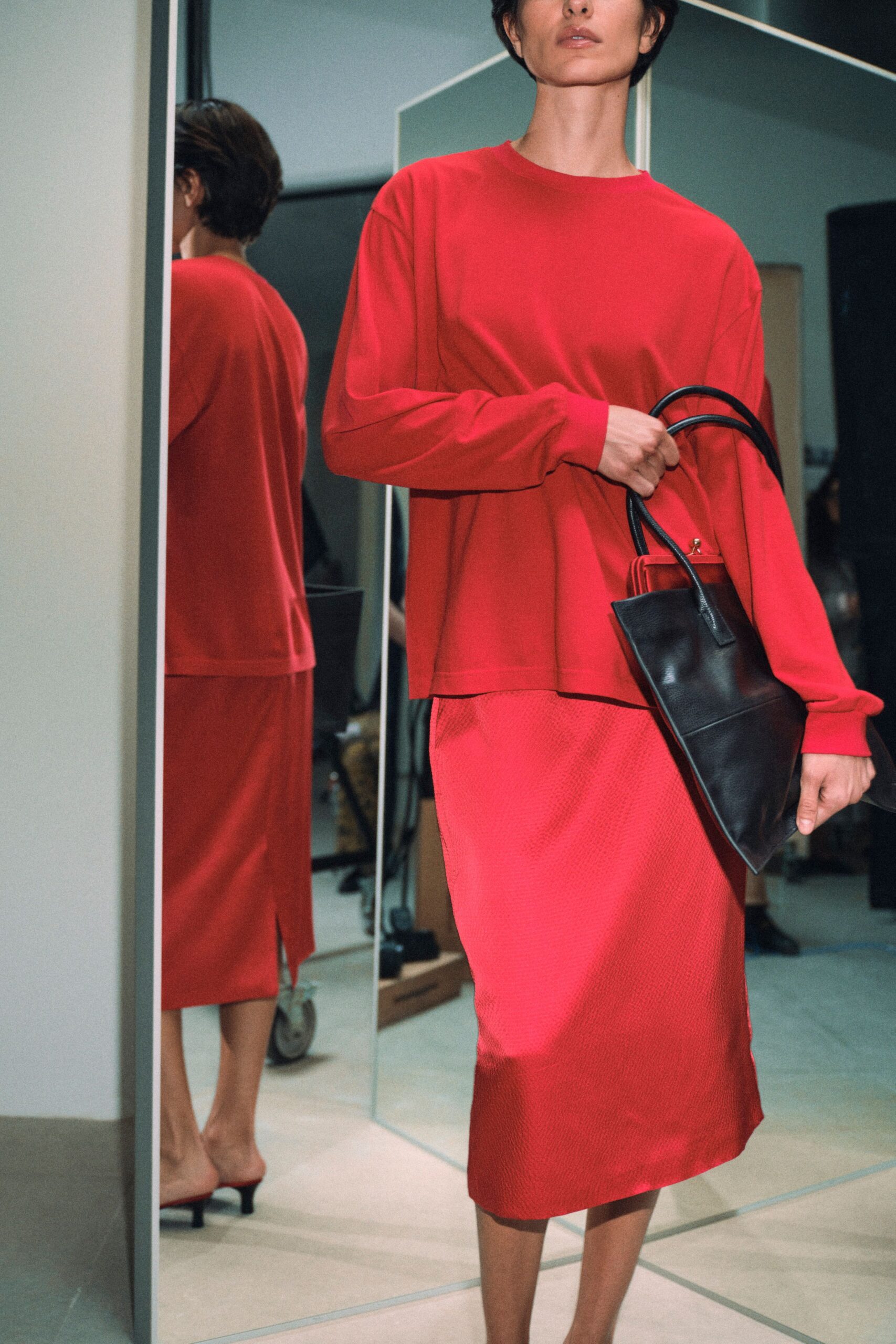 red silk slit fitted midi skirt