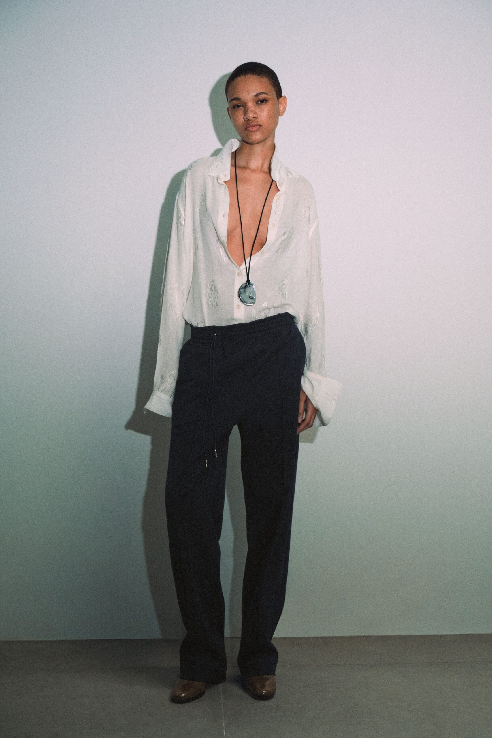 white cotton long-sleeve v-neck relaxed embroidered shirt