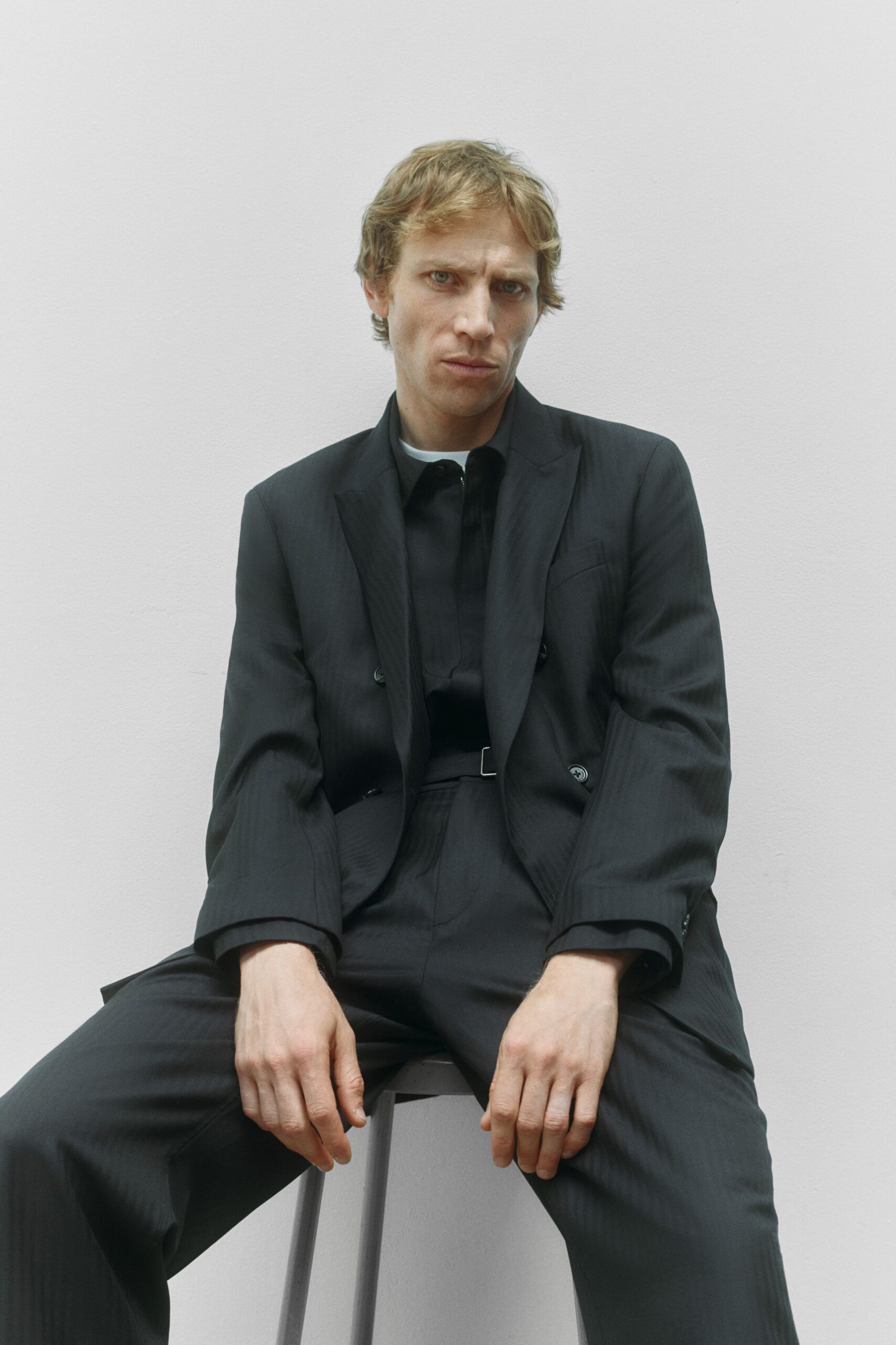 black cotton long-sleeve collared tailored striped suit