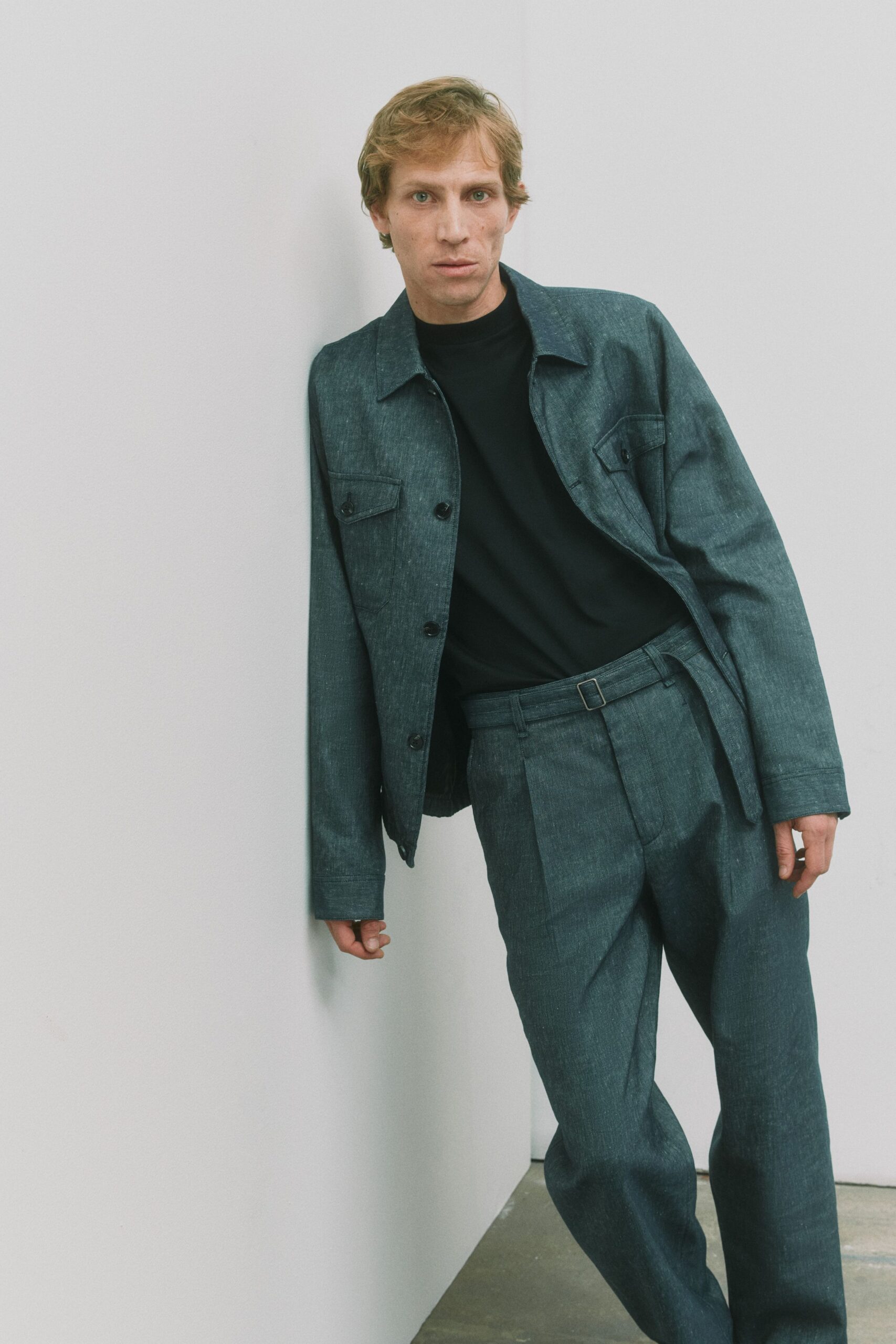 blue cotton long-sleeve collared structured buttoned jacket