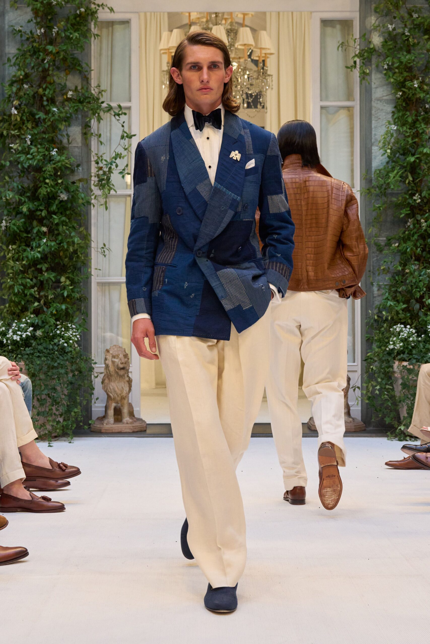 blue tailored blazer with beige pants