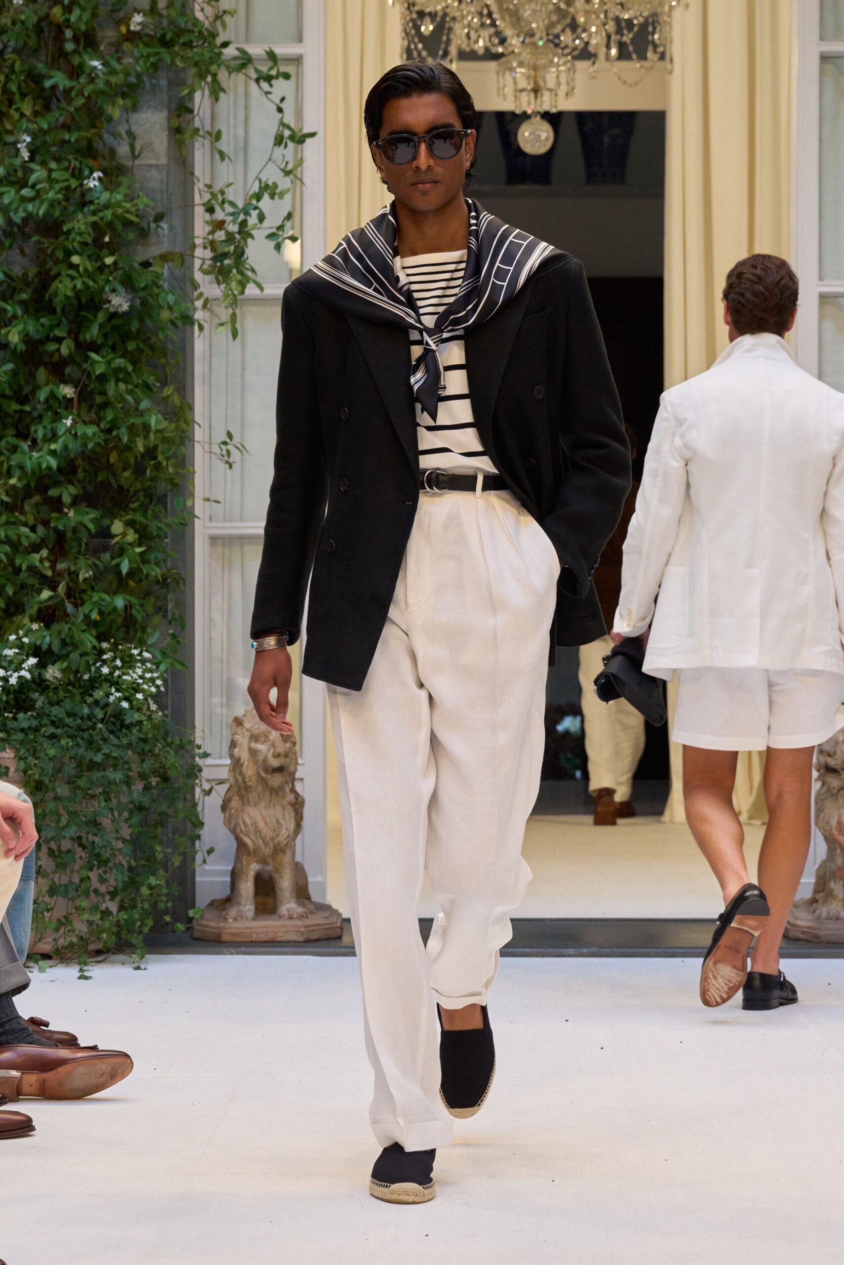 black jacket white shirt relaxed pants