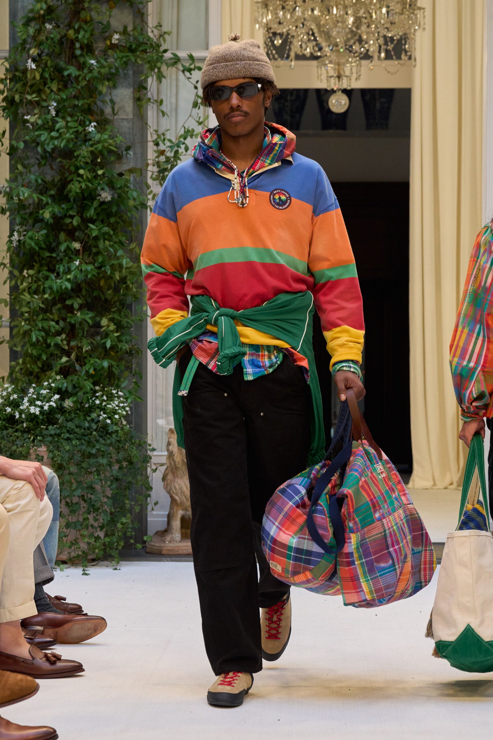 colorful hoodie and black pants