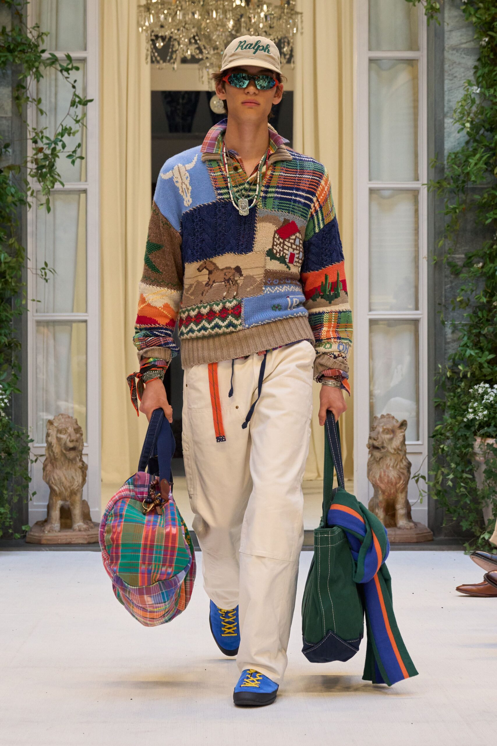 multi-colored relaxed sweater with white pants