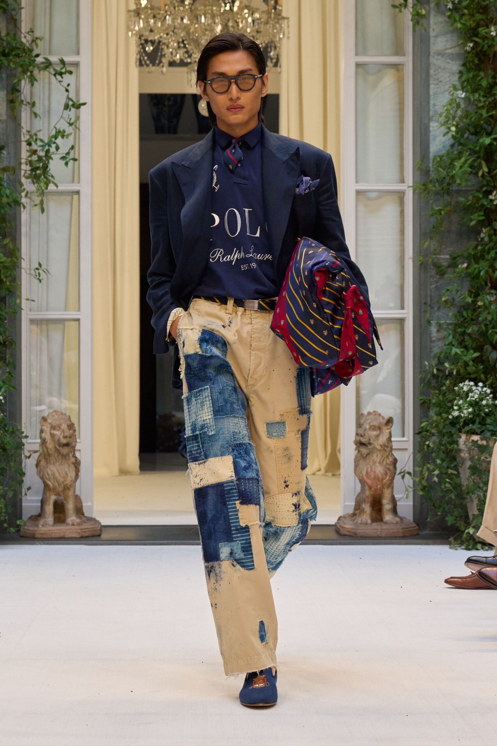 navy blazer with distressed pants