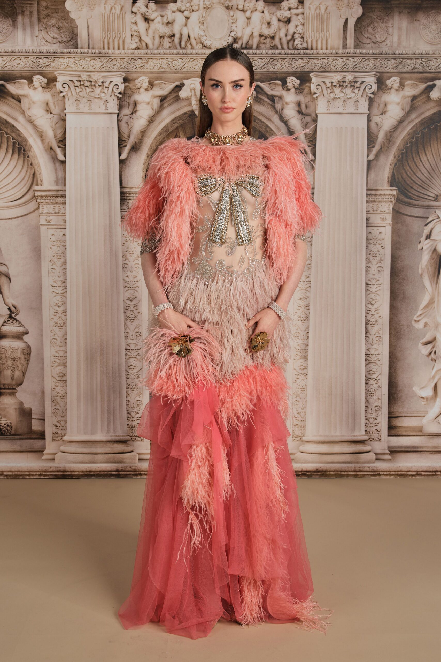 pink feathered sleeveless gown