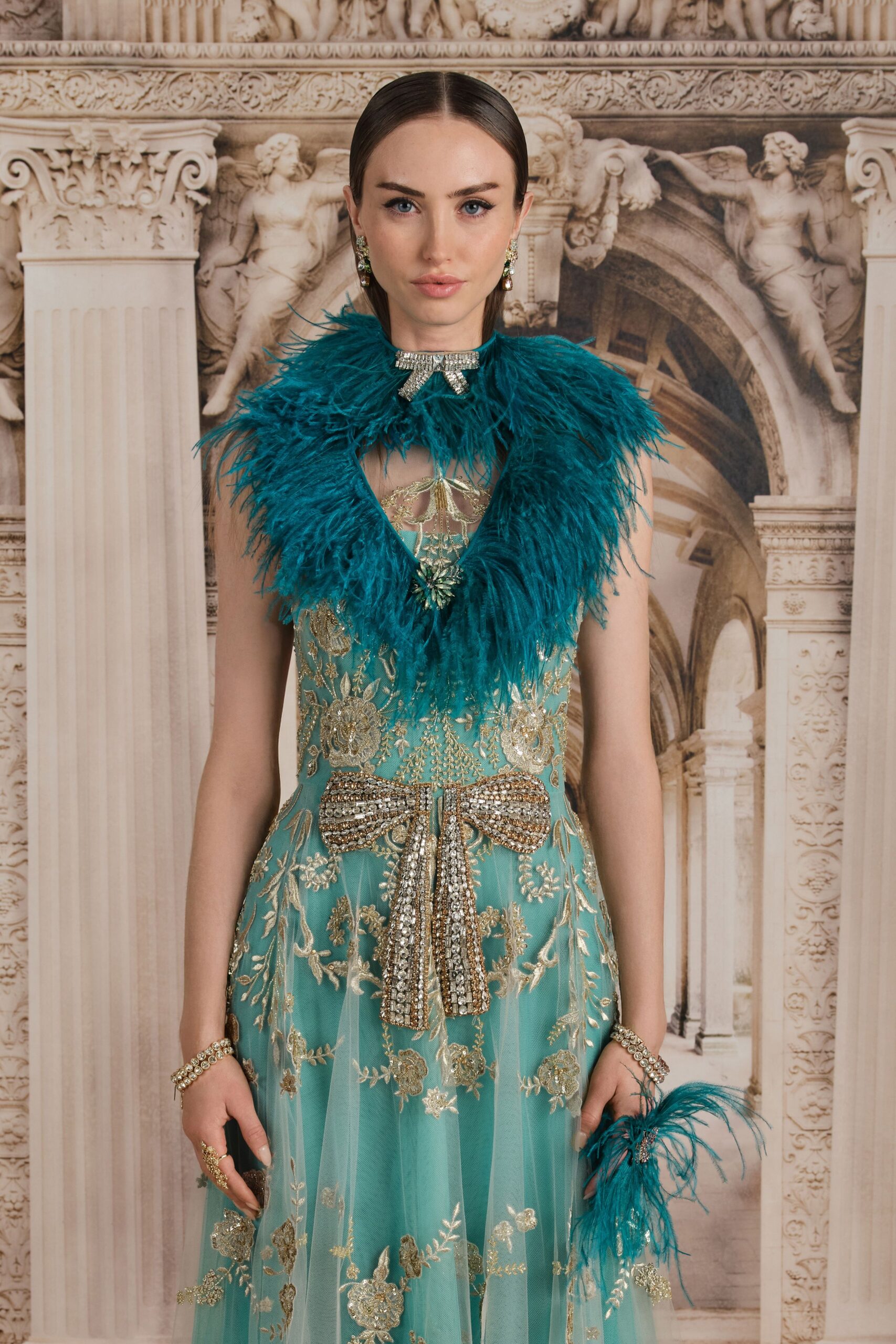 teal silk sleeveless v-neck fitted embroidered layered gown