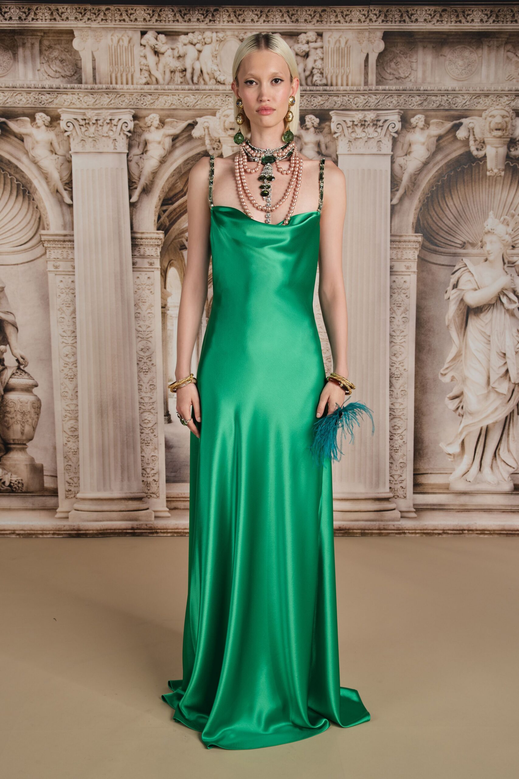 green silk sleeveless v-neck fitted flowing shiny gown