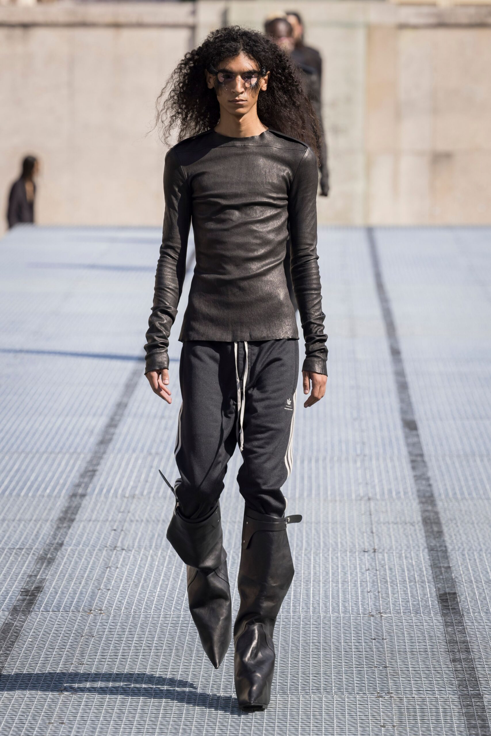 black fitted top and relaxed pants